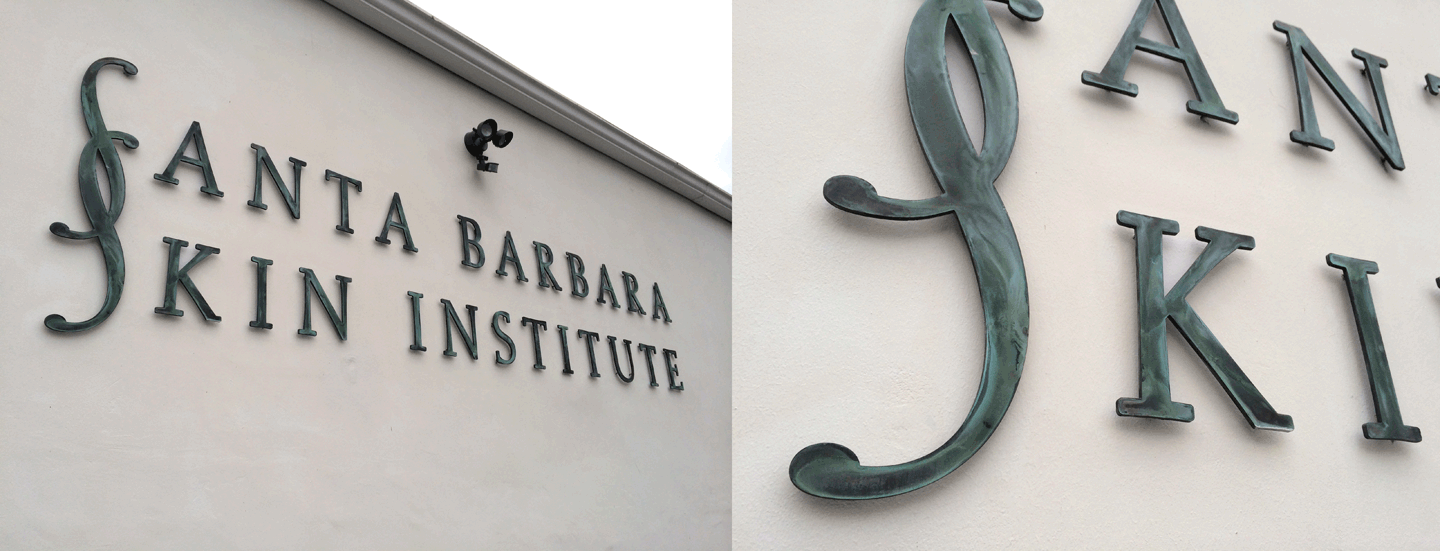 Pin mounted Bronze letters with petina finish for Santa Barbara Skin Institute. 