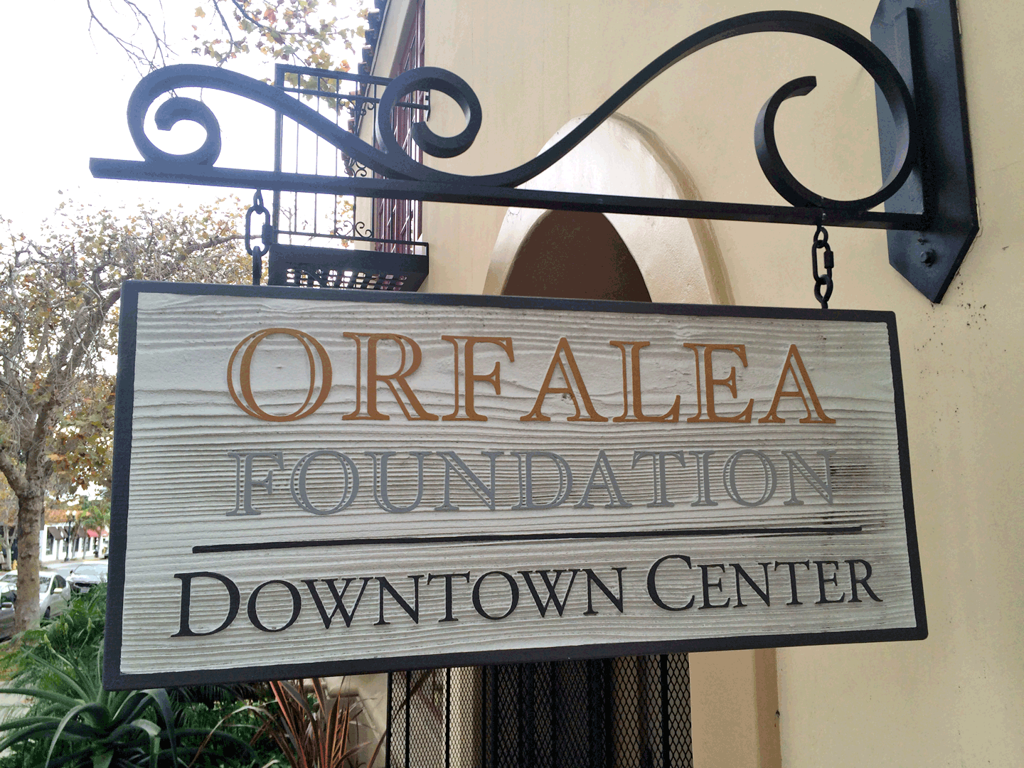 sandblasted-painted-wood-sign-bracket.png