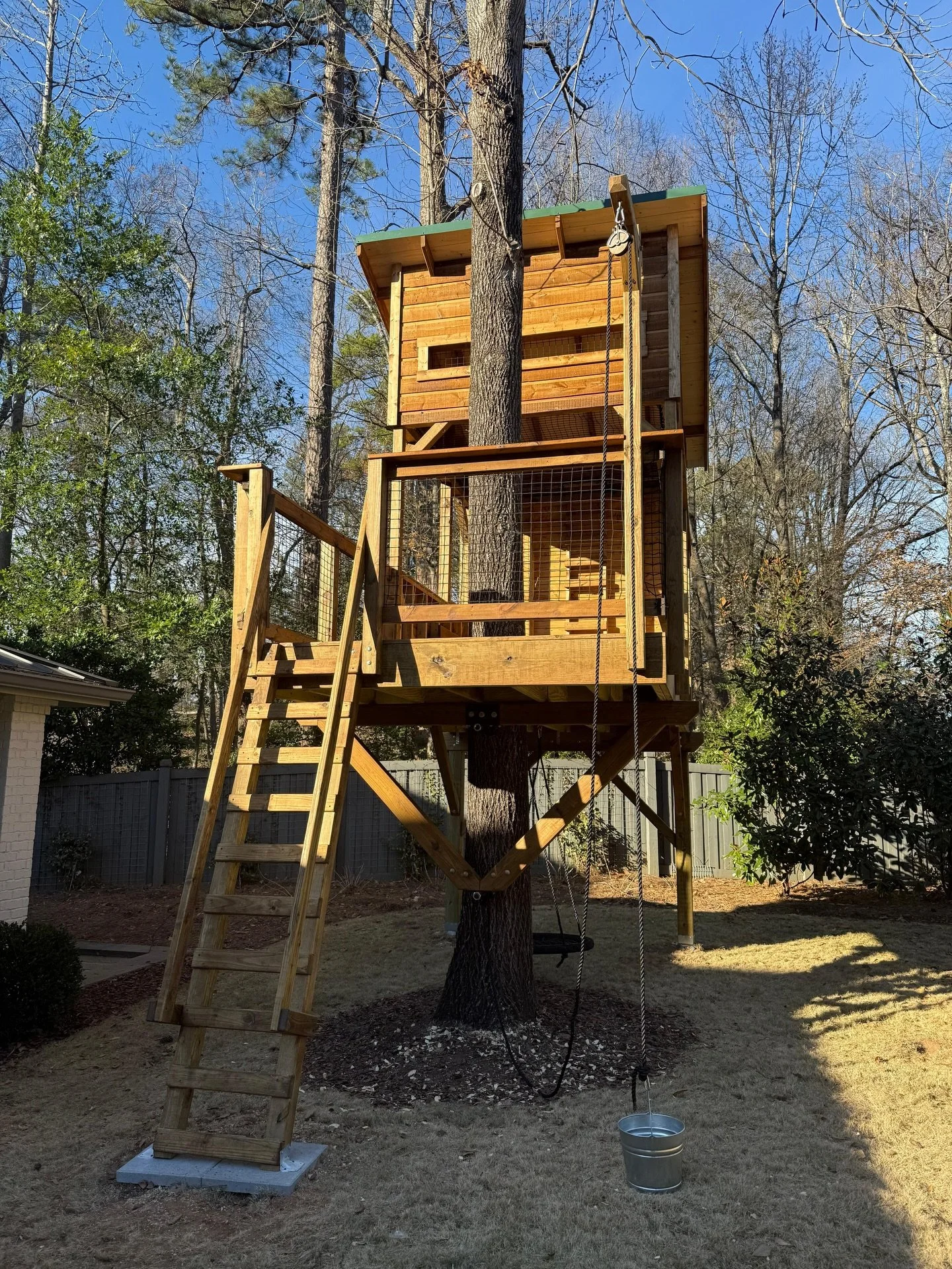 Finished just in time before the year ended&mdash;our latest open-air treehouse is here. A space where parents can keep an eye on the kids while they dive into backyard adventure. Our custom net loft, folding table, and storage bench make every inch 