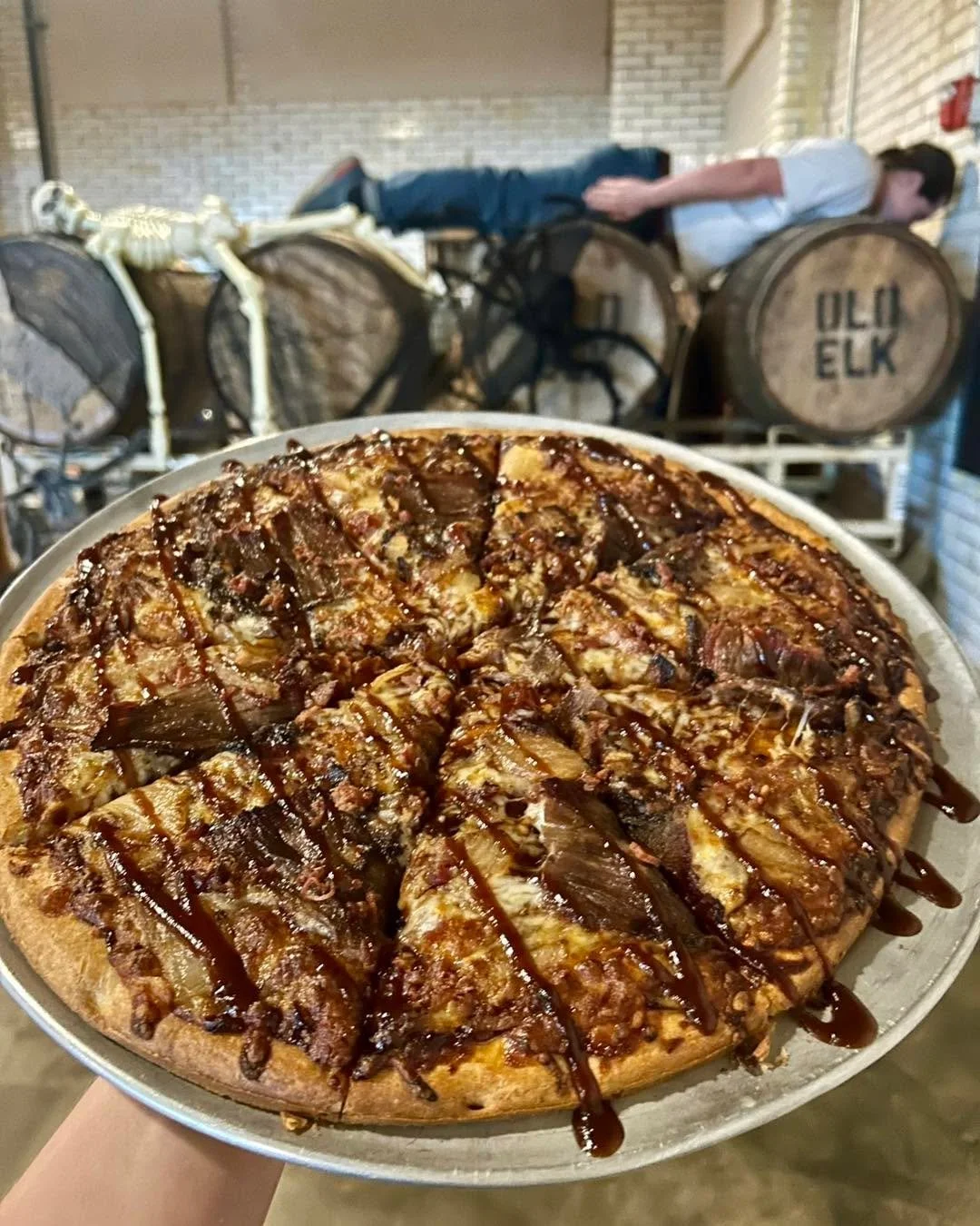 Happy Pizza Thursday!  Today&rsquo;s specialty pizza is topped with bbq sauce, mozzarella, brisket, bacon, and caramelized onion.  Just $18 for a 14&rdquo; large pizza and you can add a 4pack (to go) or a pitcher (for here) for only $7 more!