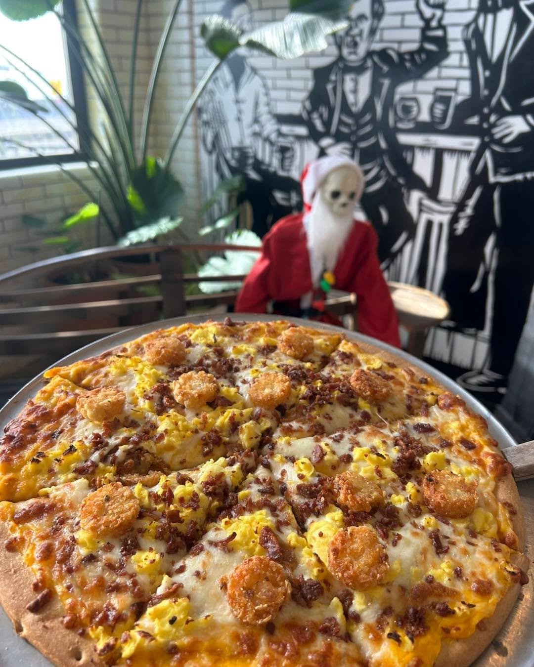 Happy Pizza Thursday!  Today&rsquo;s Specialty pizza is a breakfast za topped with cheese sauce, mozzarella, eggs, bacon, and hashbrown medallions!