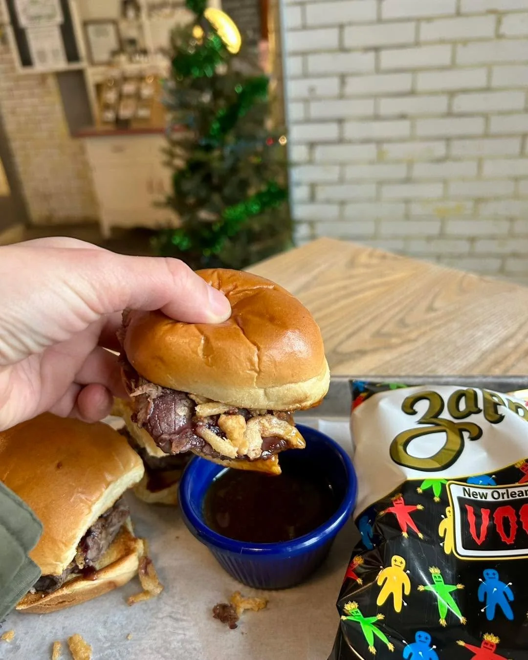 Oopsie, I kind of started eating it before I got a really good picture BUT now I can vouch that we&rsquo;ve got a very tasty special for you today.  Roast Beef Sliders on lil brioche buns topped with horseradish sauce, Cabernet reduction, and crispy 