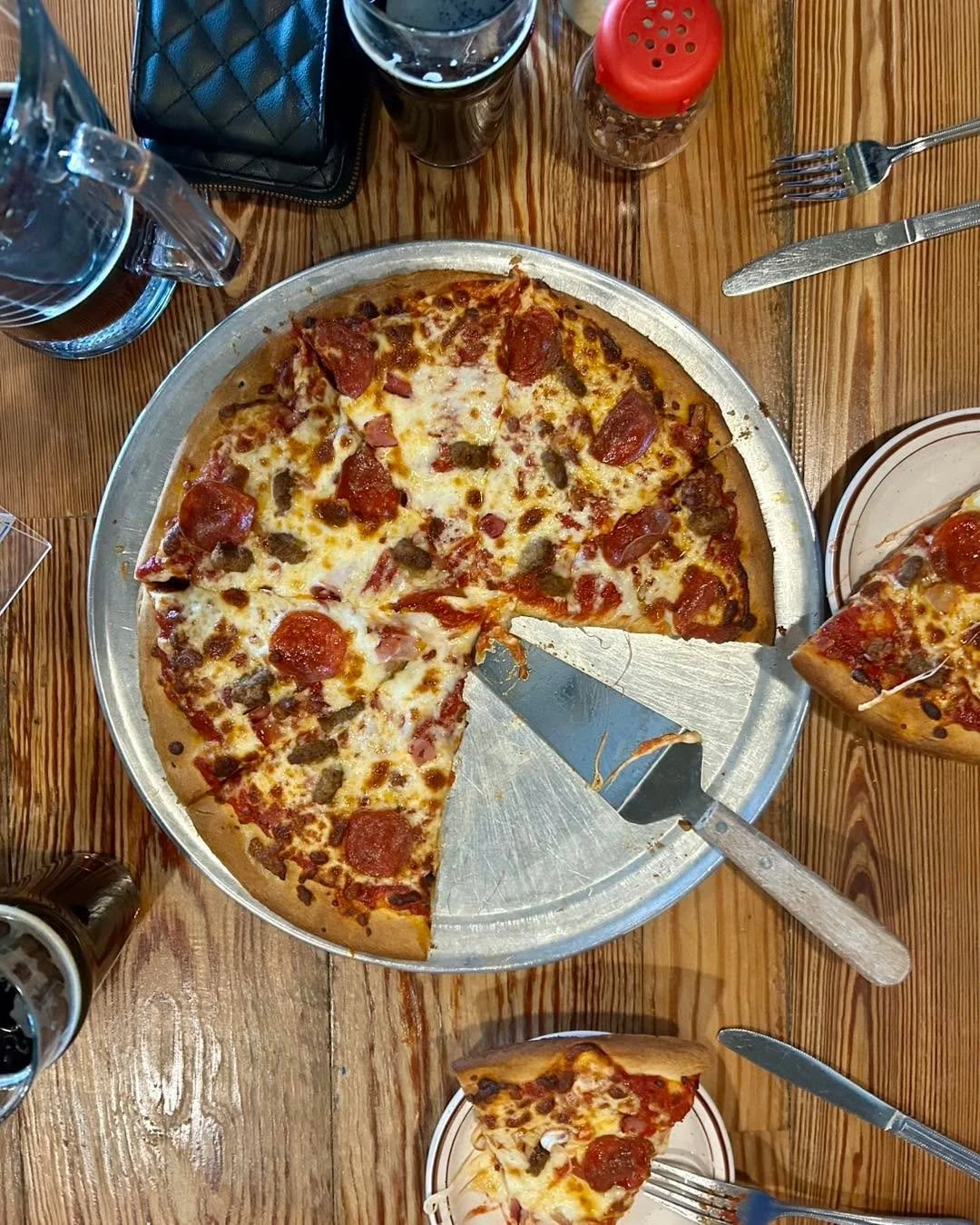 Happy Pizza Thursday!  Today&rsquo;s specialty pizza is a meat lovers - topped with marinara, mozzarella, bacon, ham, pepperoni, and sausage. $18 for a large 14&rdquo; specialty pizza and you can pair it with a pitcher (for here) or a 4-pack (to go) 