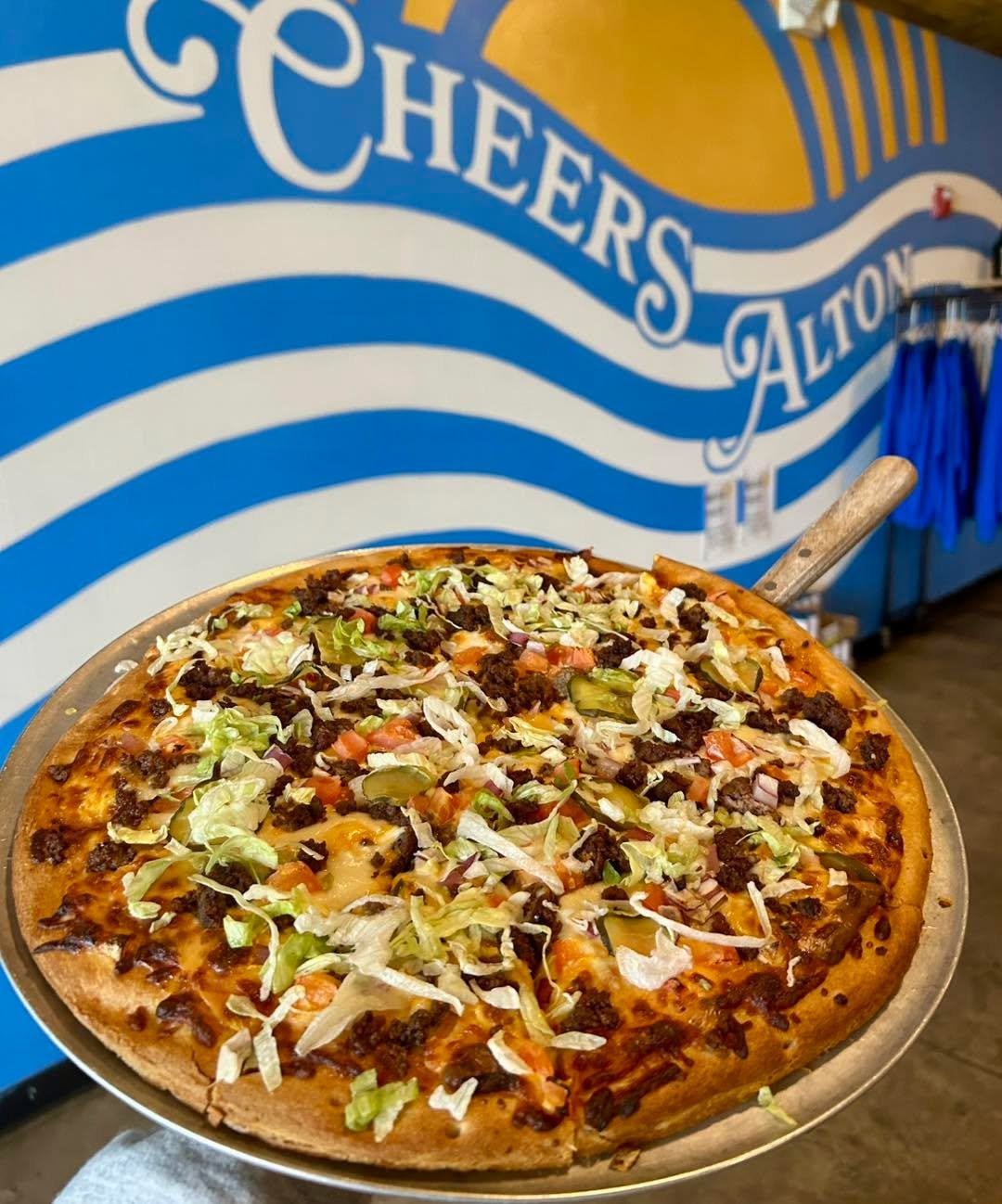 Happy Pizza Thursday!  Today&rsquo;s pizza special is topped with burger sauce, mozzarella, American, ground beef, lettuce, tomato, and pickles 🤤