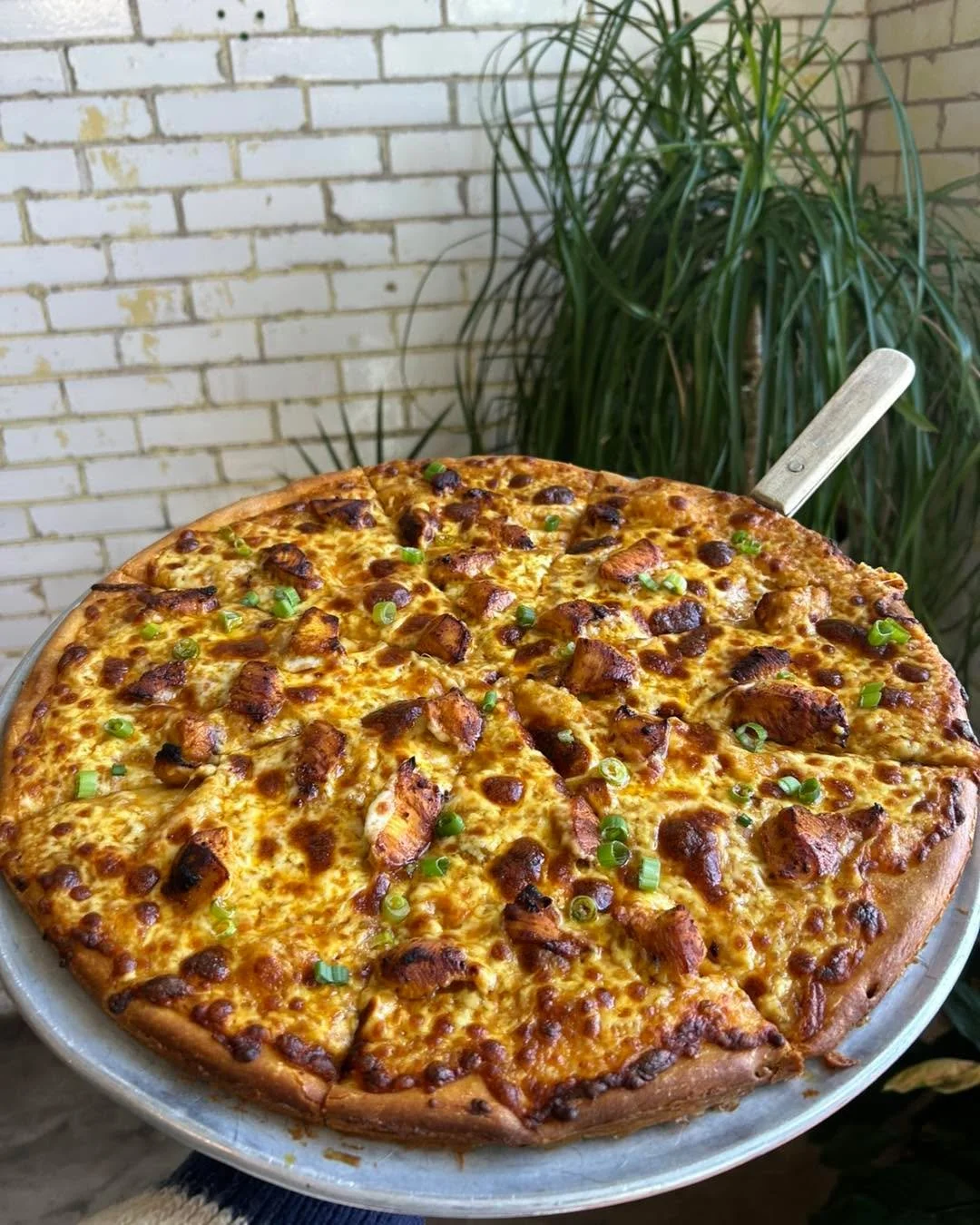 It&rsquo;s a happy pizza Thursday indeed!  Today&rsquo;s specialty pizza today is inspired by by butter chicken and topped with a classic butter chicken sauce, marinated chicken, mozzarella, and green onion.  Only $18 for this large 14&rdquo; pizza p