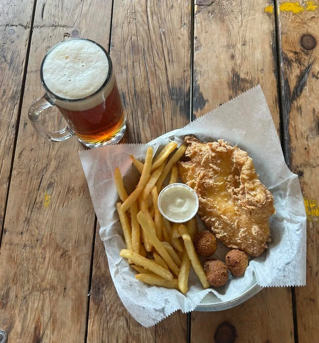 It&rsquo;s Fish Fry Friday yall!

Beer battered fish and chips served with hush puppies and tartar sauce, available every Friday!  Pairs well with beer