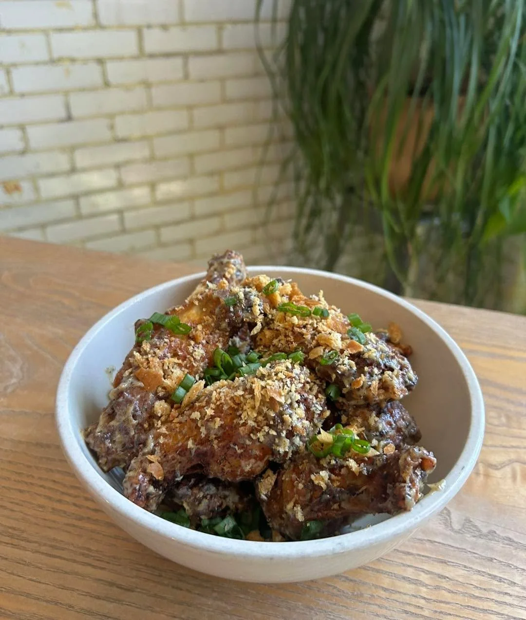 One of our most exciting summer menu items is a collab with our friends from Pizzeoli Wood Fired Pizza!  We dry rubbed some wings, fried them, tossed them in Pizzeoli&rsquo;s famous Mayfair sauce and then topped them with breadcrumbs and green onion!