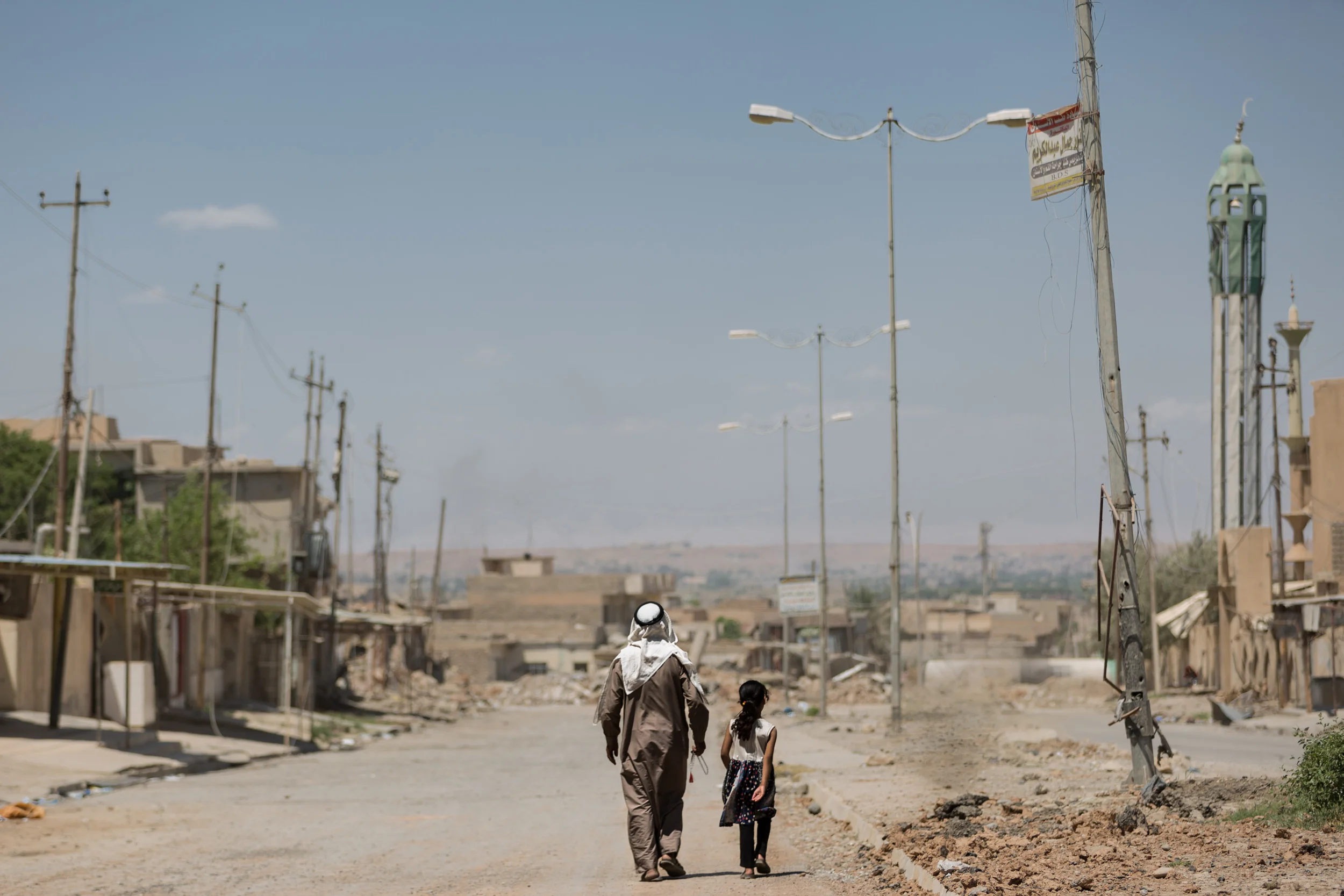 The battle to retake Mosul from the Islamic State (ISIS) began in October 2016 and “officially” ended in July 2017. These images are from May 2017, as Coalition forces fought their way through the neighborhoods of West Mosul, clearing each of militants and leaving a path of destruction in their wake. As neighborhoods were “liberated” civilians who had fled made their way back to what remained of their homes. Though the fighting has largely subsided the struggle for Moslawis continues to this day as they work to rebuild their city and their lives. 05.31.2017