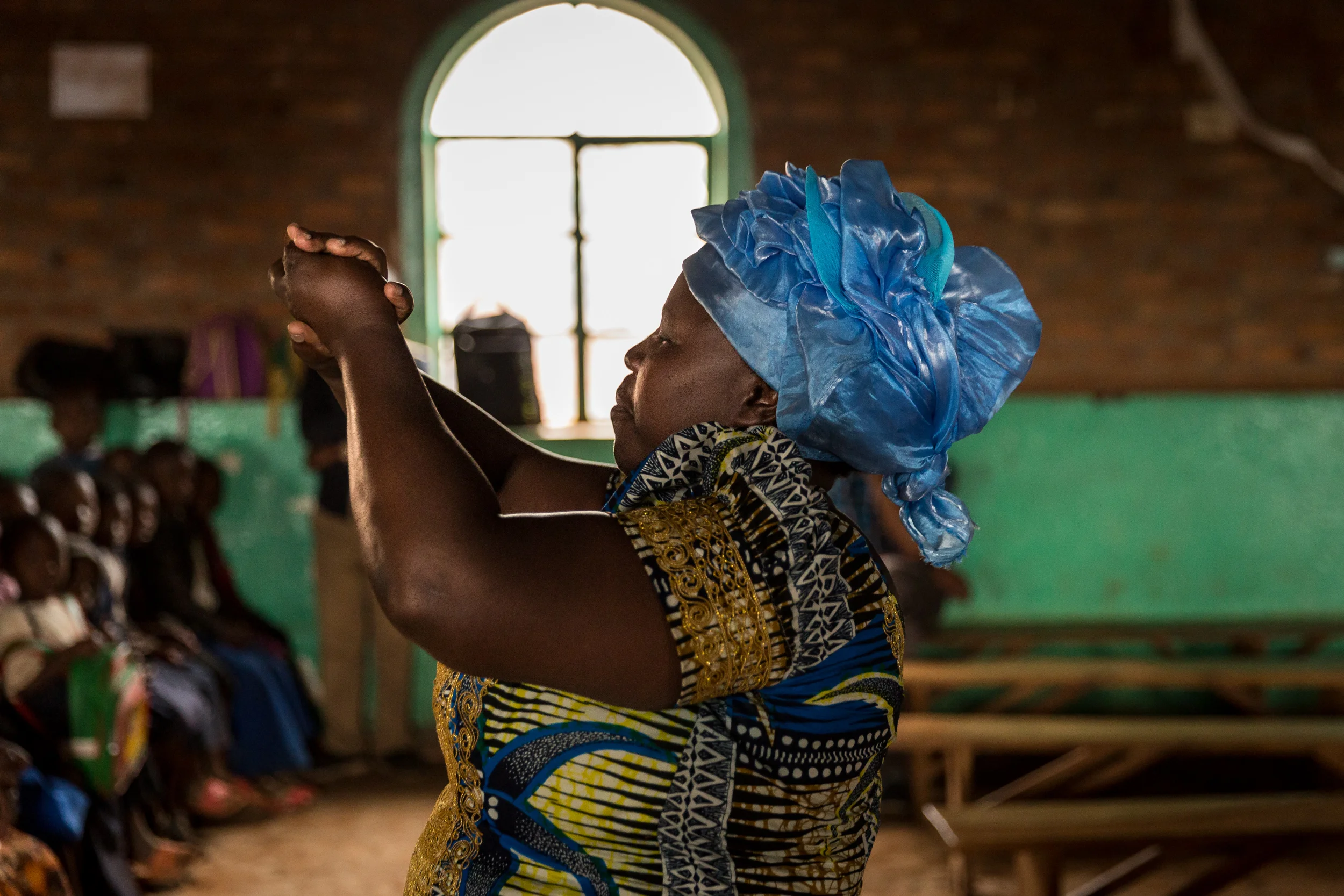 Mama Salome demonstrates hand washing before a crowd of 300 school children in the Karambi area of Bukavu Eastern Democratic Republic of Congo. In 2008 international aid agencies named October 15th a day to celebrate hand-washing and its health benefits. Lack of access to water, and especially clean water, is seen as the primary reason that many in the country do not regularly wash their hands. 10.15.2017