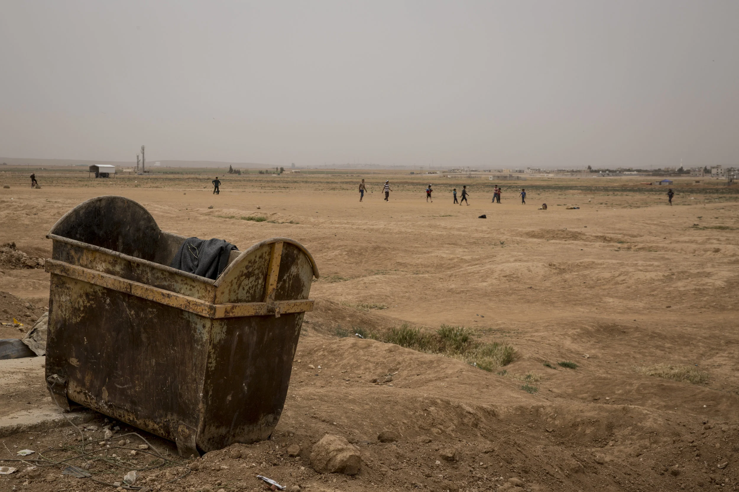 Barren land doubles as a soccer pitch. Inside the Zaatari Refugee Camp 04.15.2016