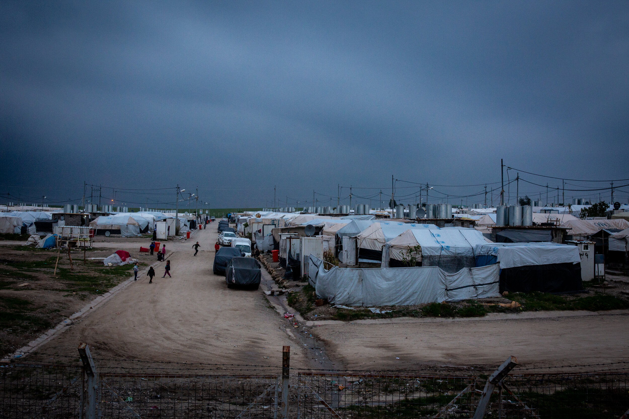 During the winter months, as the day comes to an end, the Bajad Kandala Displacement camp can take on a cool, bluish hue as many residents end their days. With limited electricity and few able to afford fuel and generators, daily life within the camp is largely dictated by the sunrise and sunset.