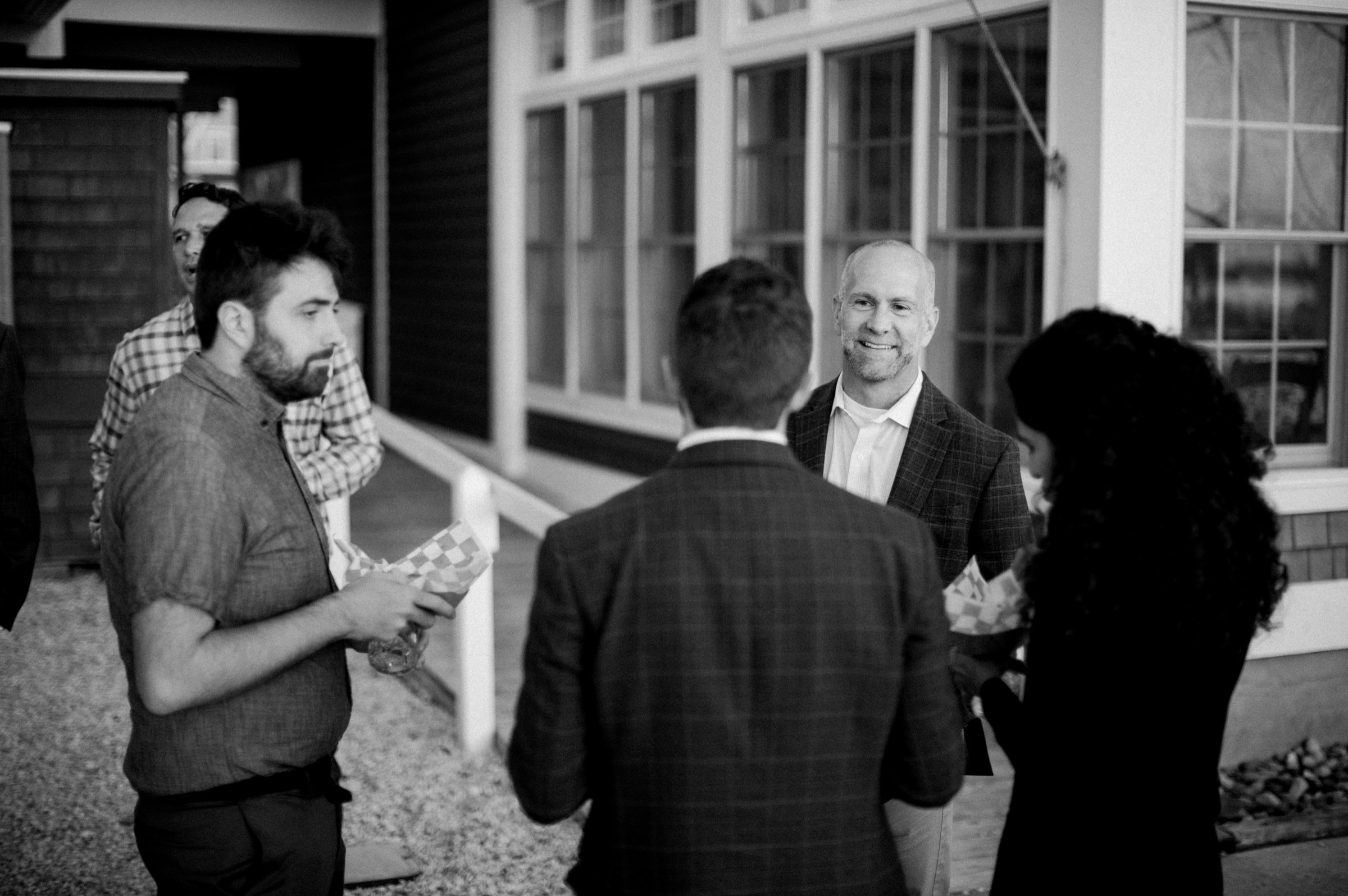 12_guests mingling at mantoloking rehearsal dinner.jpg