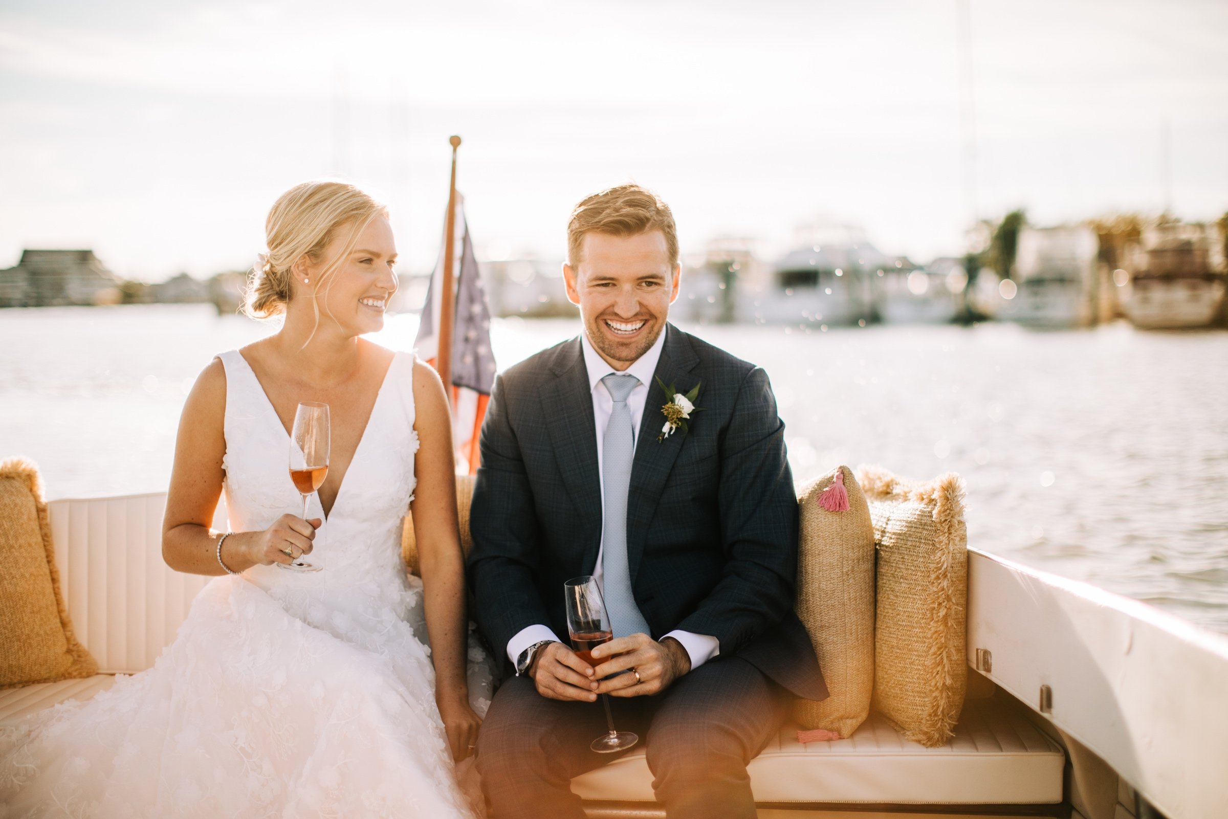 54_bride and groom on ferry to bay head yacht club reception.jpg