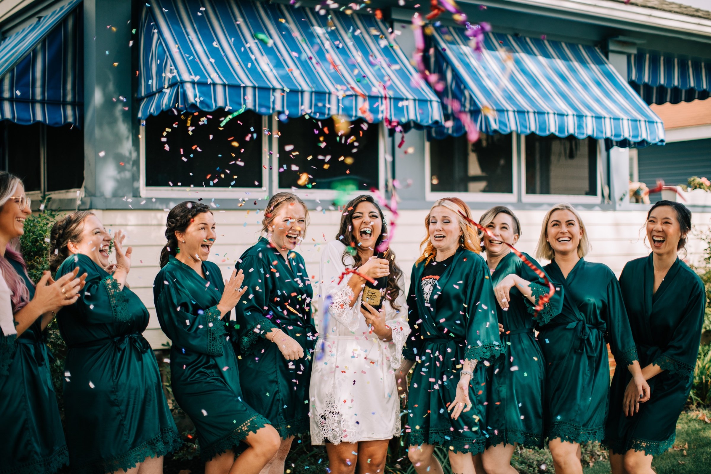 09_bride with bridesmaids before historic chapel wedding.jpg