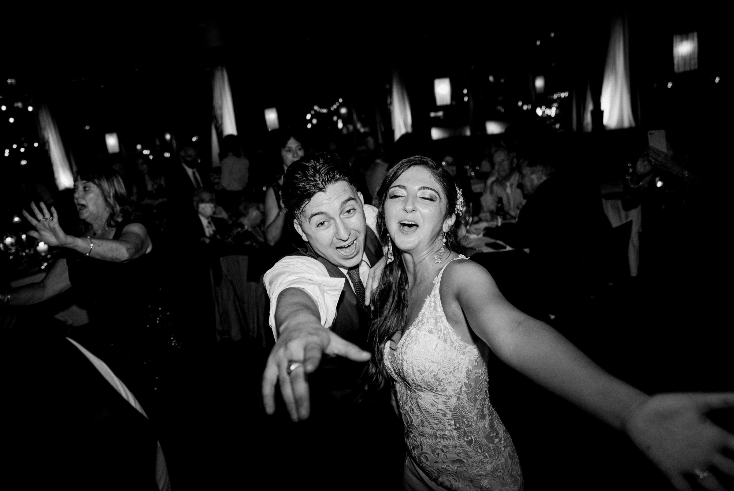 55_bride and groom celebrating tim mcloones supper club reception new jersey.jpg
