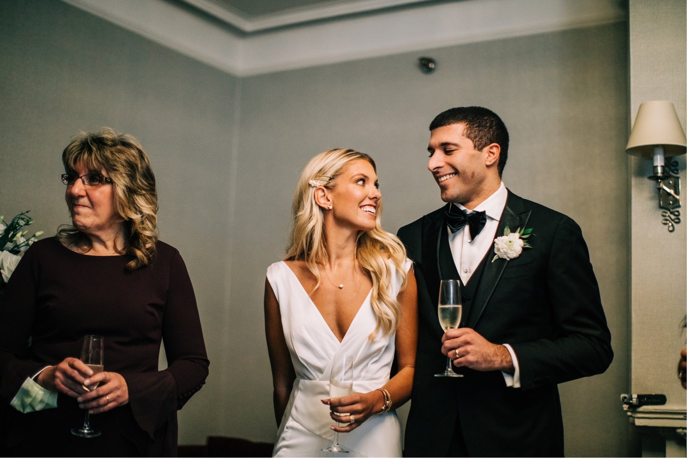 34_champagne toast boston southend winter wedding.jpg