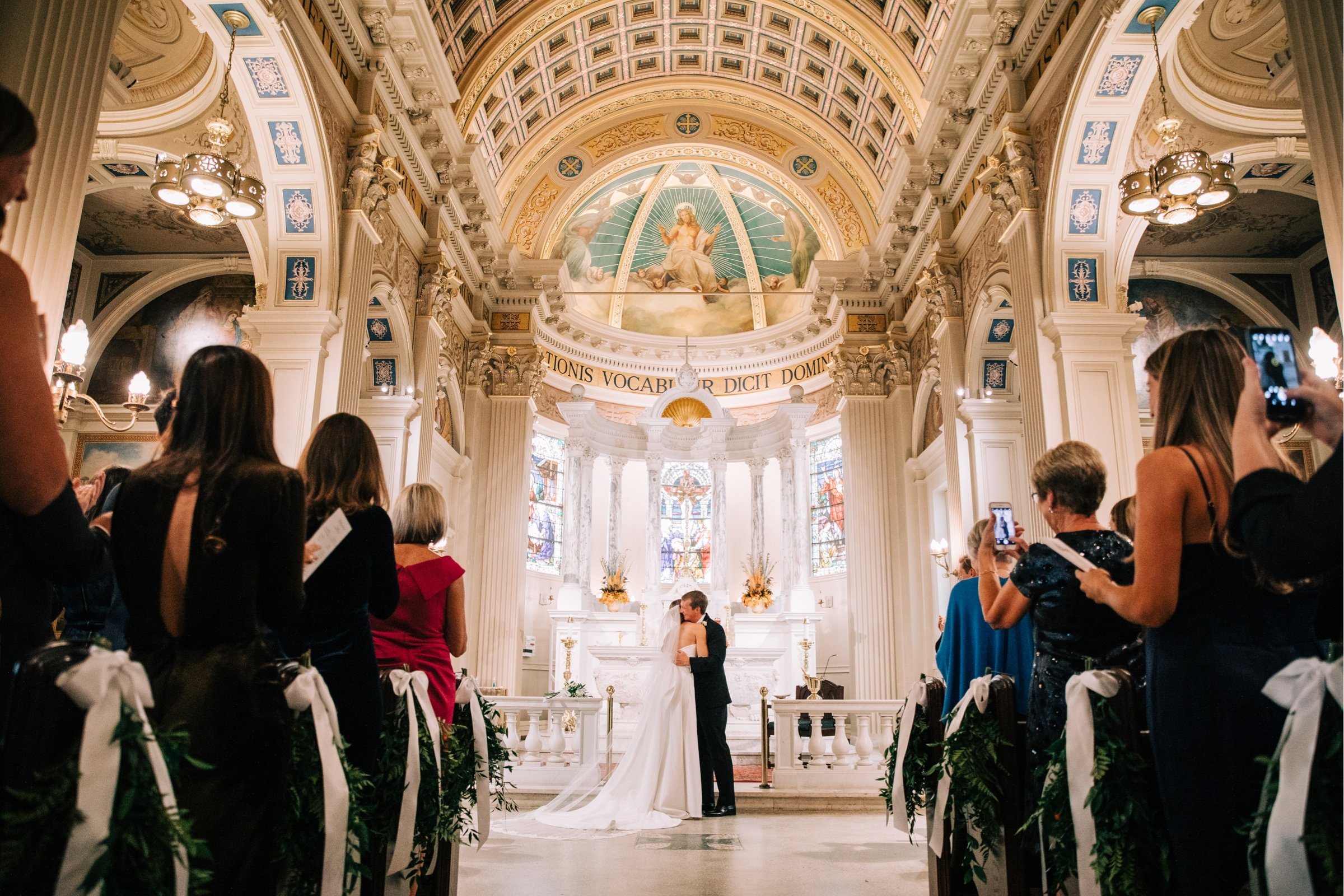 24_first kiss at st catherines church ceremony.jpg