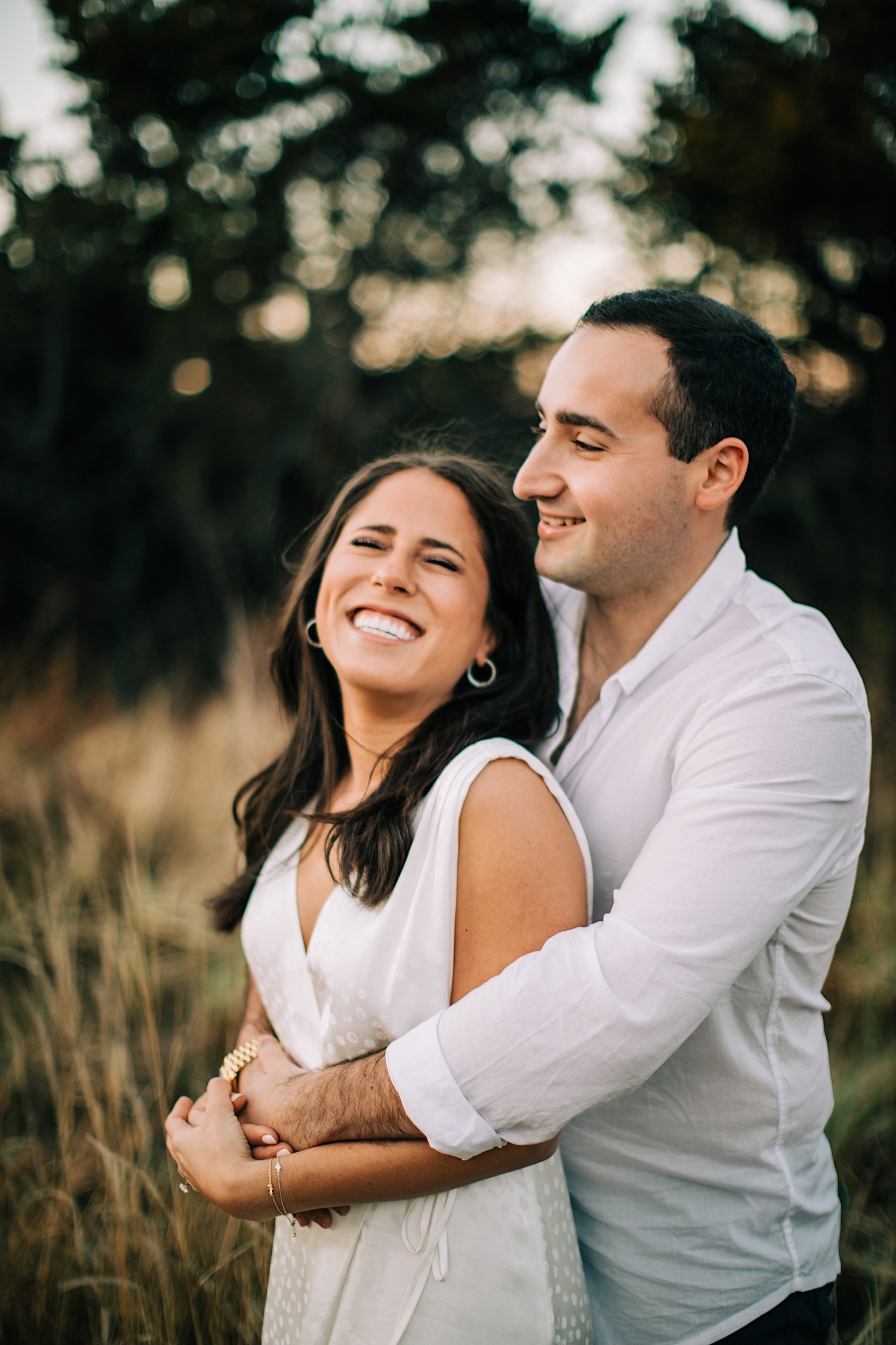 04_laughing during engagement session atlantic highlands.jpg