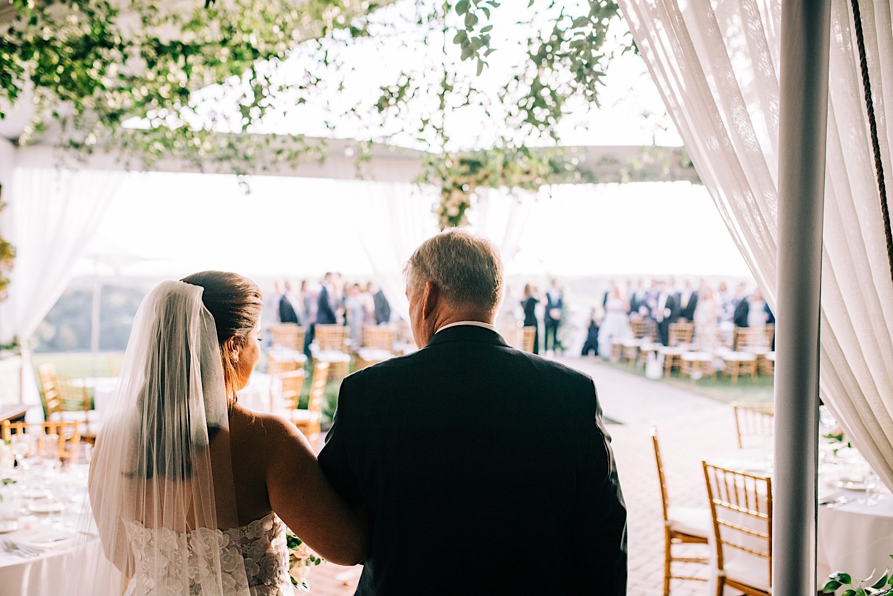 24_bride walking down aisle with father mini wedding natirar peacock nj.jpg