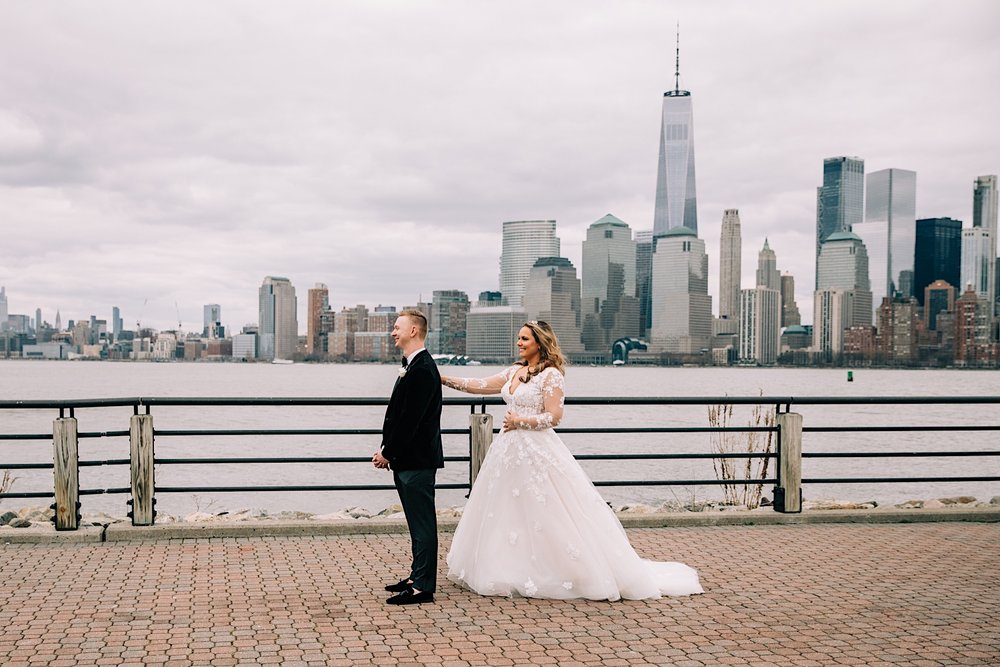 40_bride and groom first look nye skyline .jpg