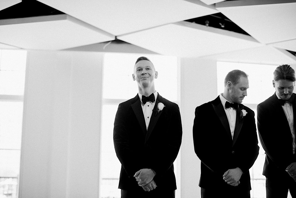 57_groom at wedding ceremony jersey city.jpg