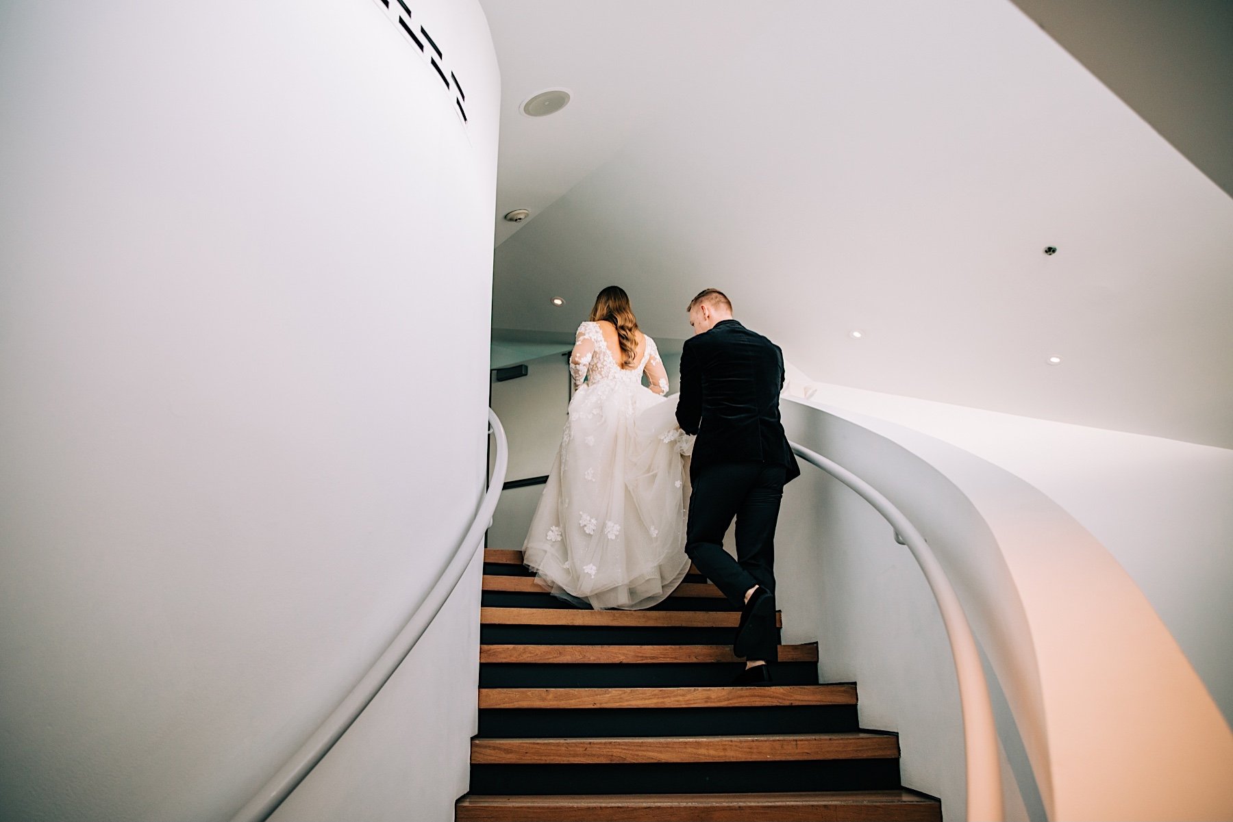 65_bride and groom exit jersey city wedding.jpg