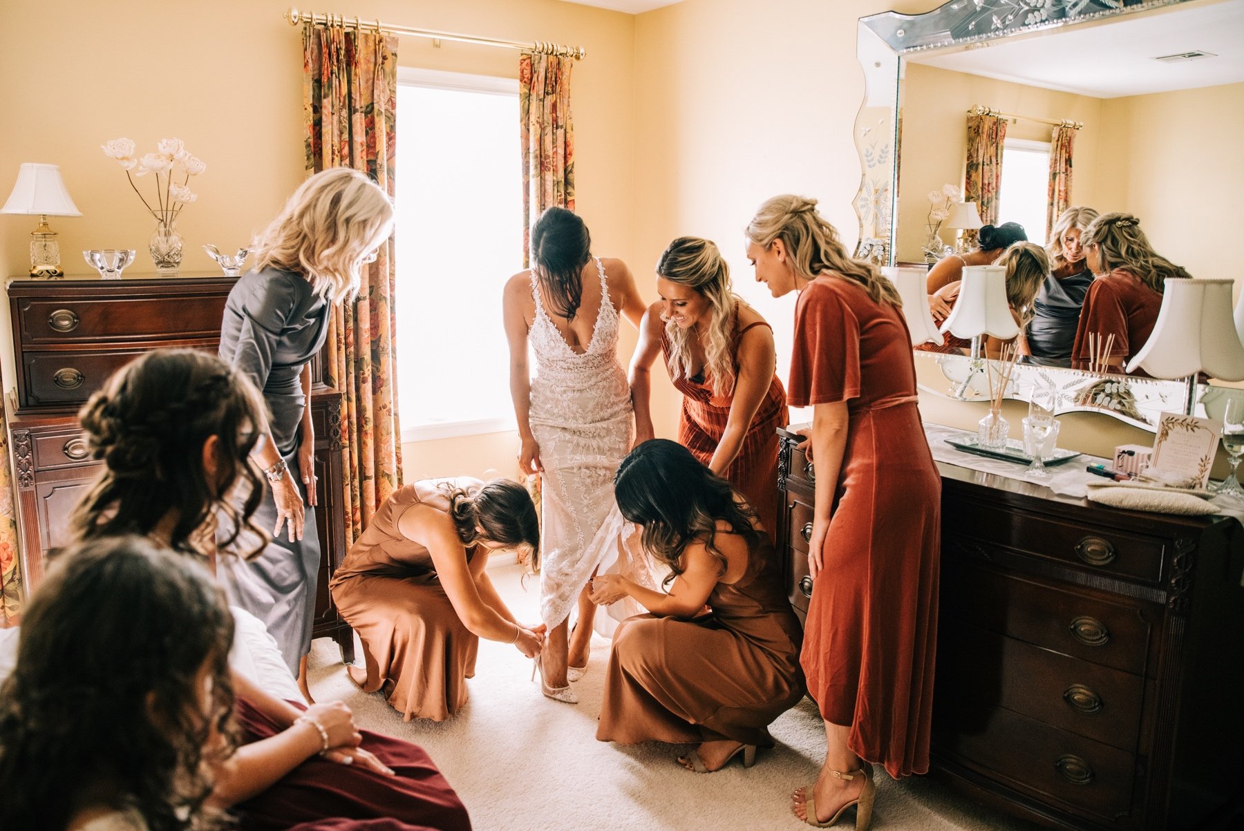 10_bride and bridesmaids getting ready before atlantic highlands church ceremony.jpg