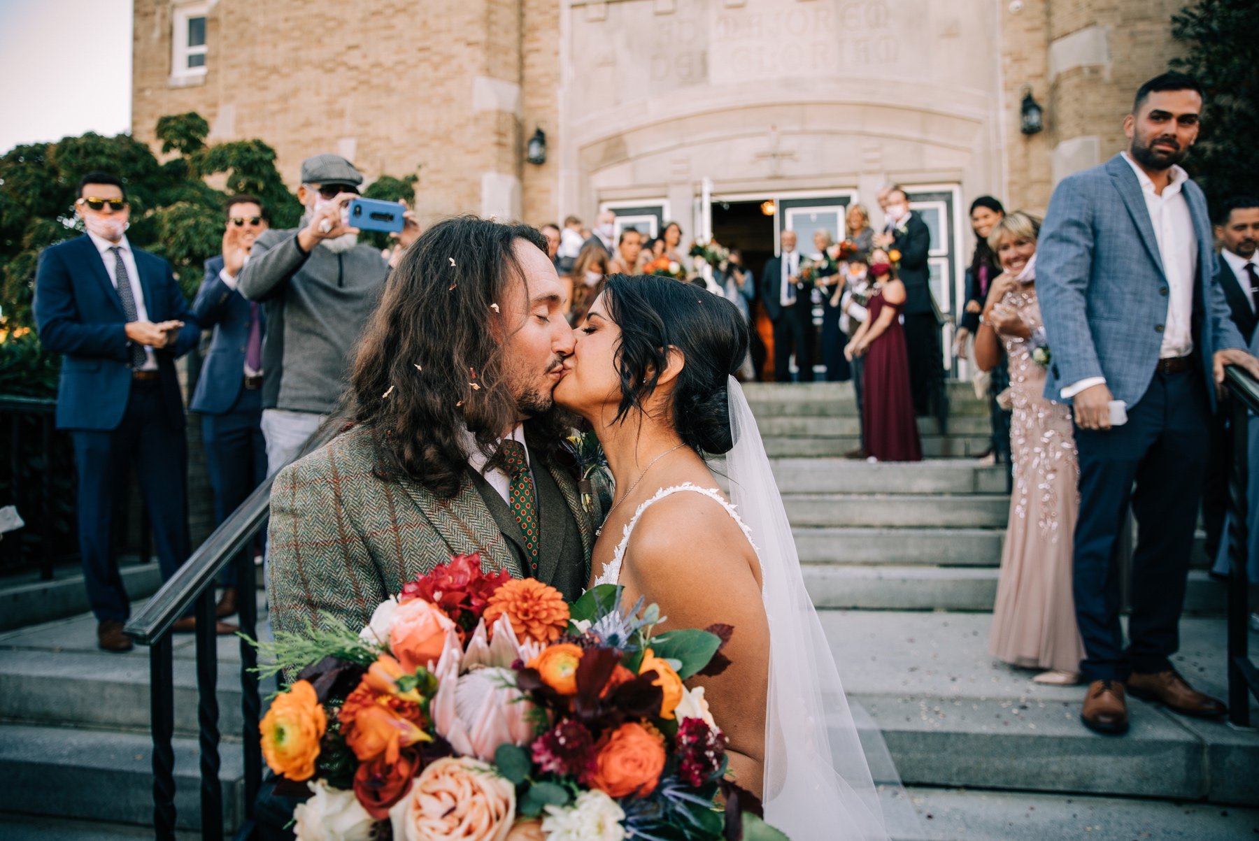 21_bride and groom kiss riverside wedding jersey shore.jpg