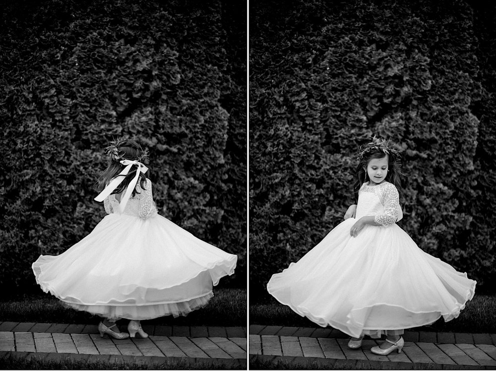 24_flower girl twirling divine park wedding.jpg