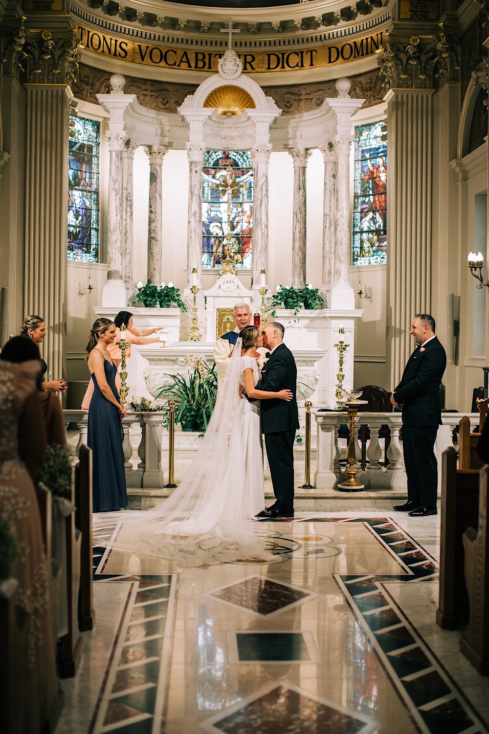 41_first kiss st catherines church wedding spring lake nj.jpg