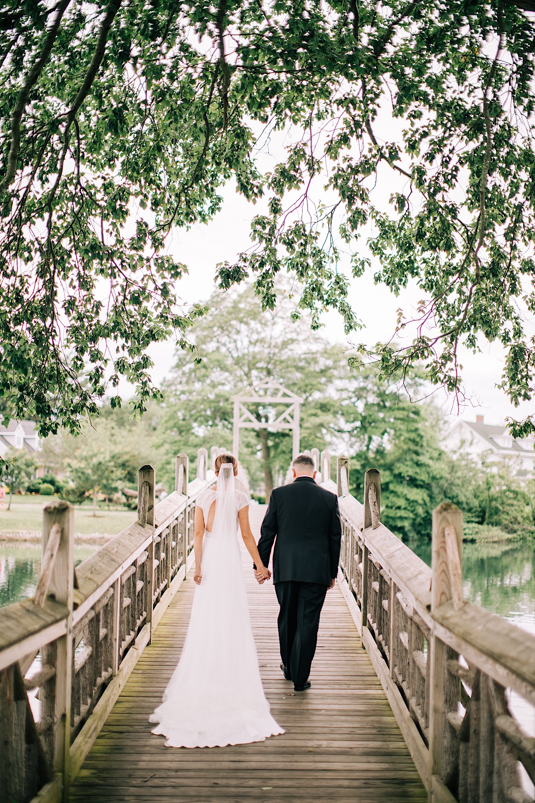 47_bride and groom bridge portrait divine park wedding.jpg