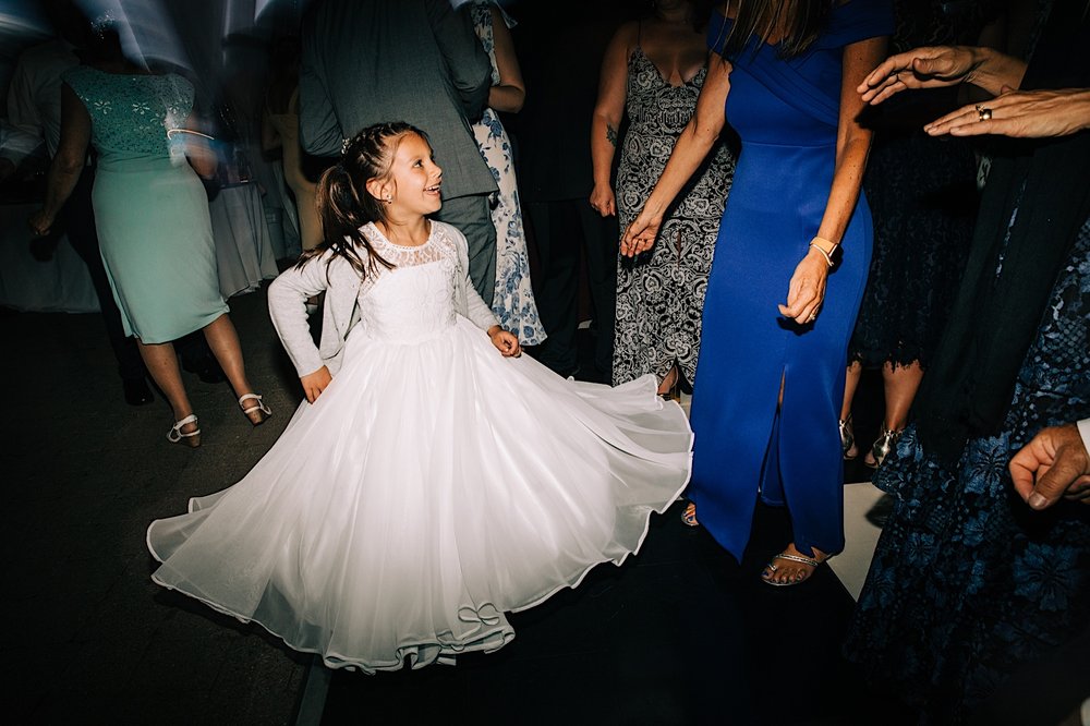 65_flower girl dancing at spring lake wedding reception.jpg