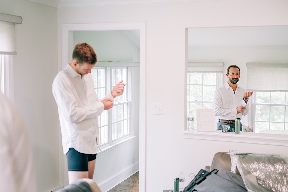 29_groom getting ready cross keys estate wedding.jpg