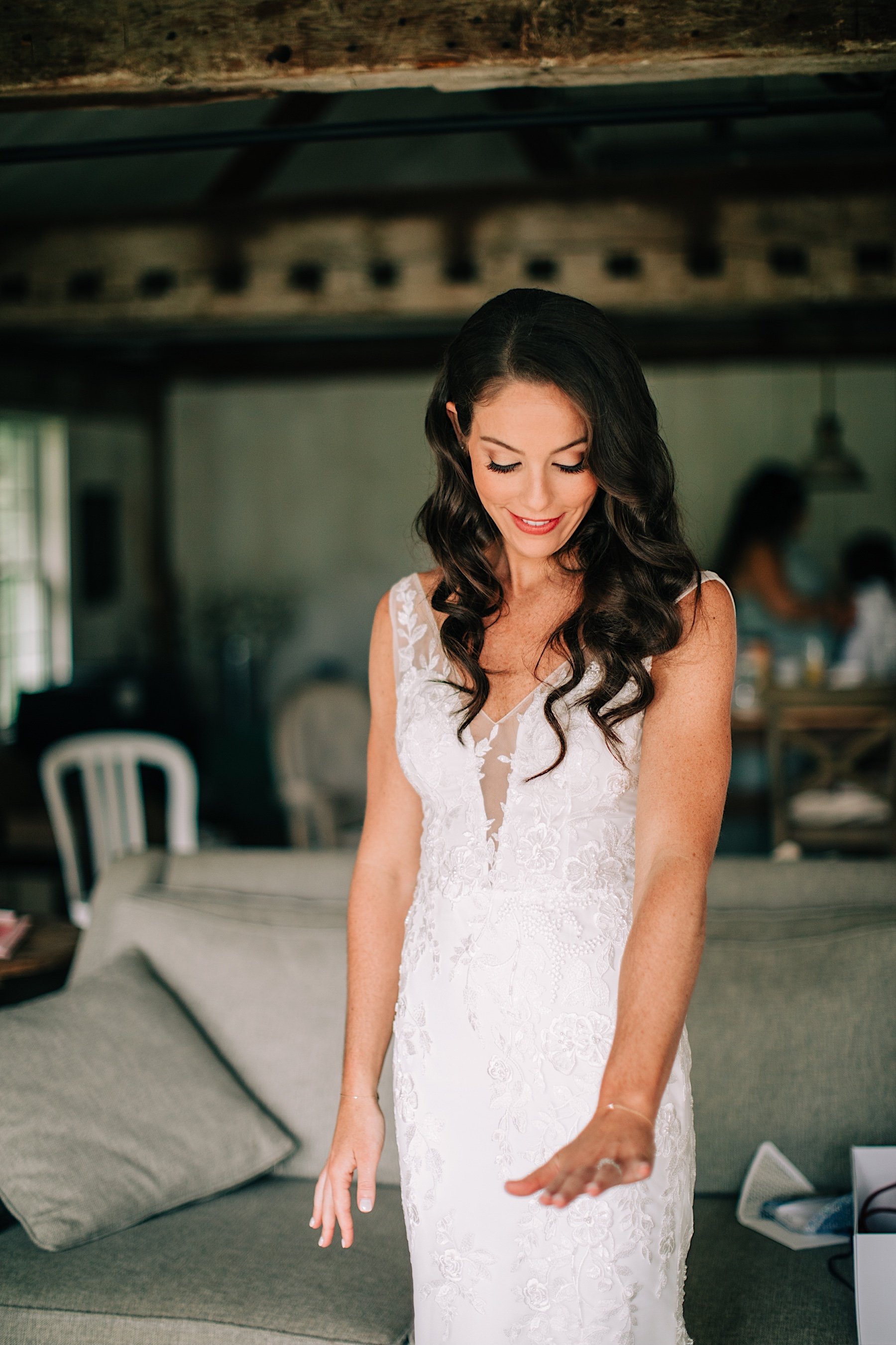 39_bride looking at ring cross keys estate wedding.jpg