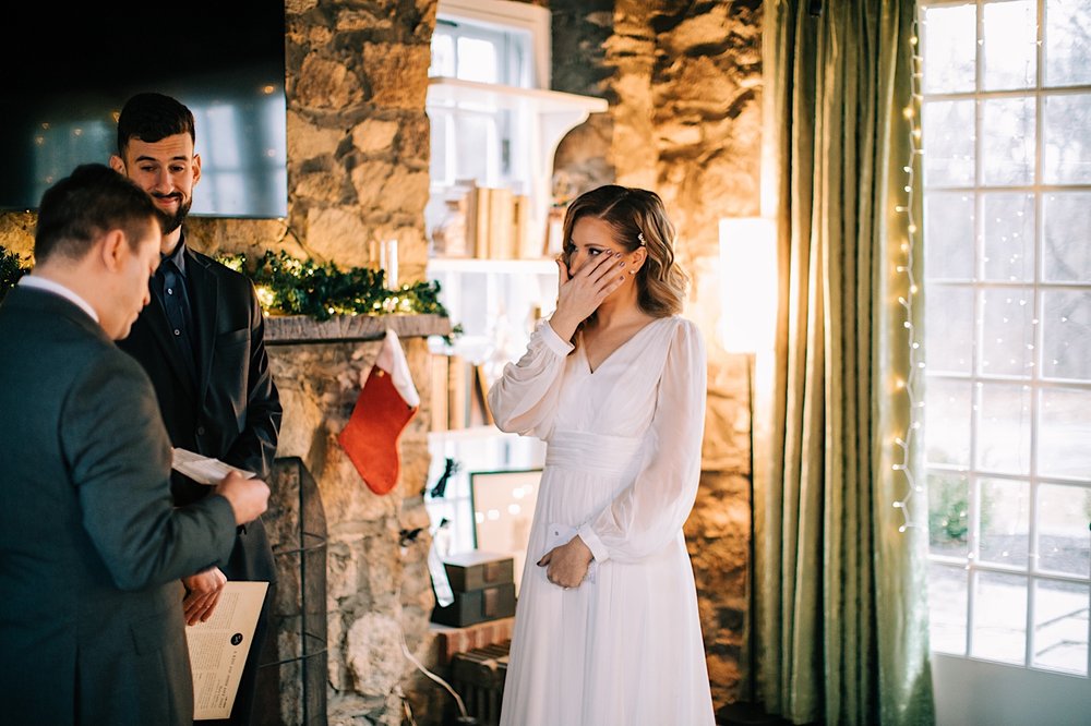 18_bride crying at ceremony december micro wedding.jpg