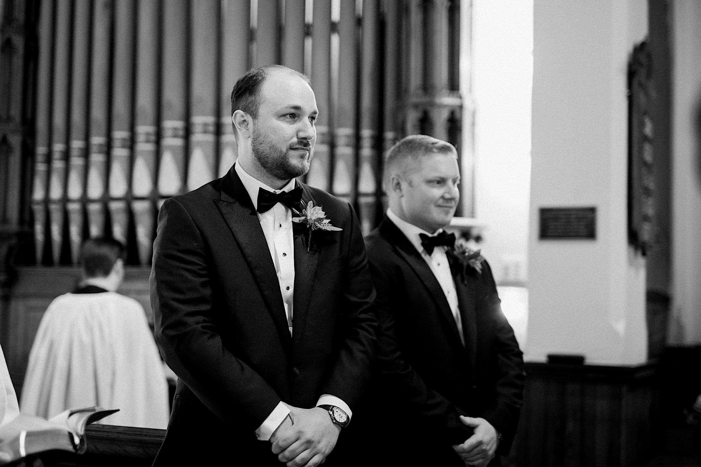 29_groom at holy trinity spring lake wedding.jpg