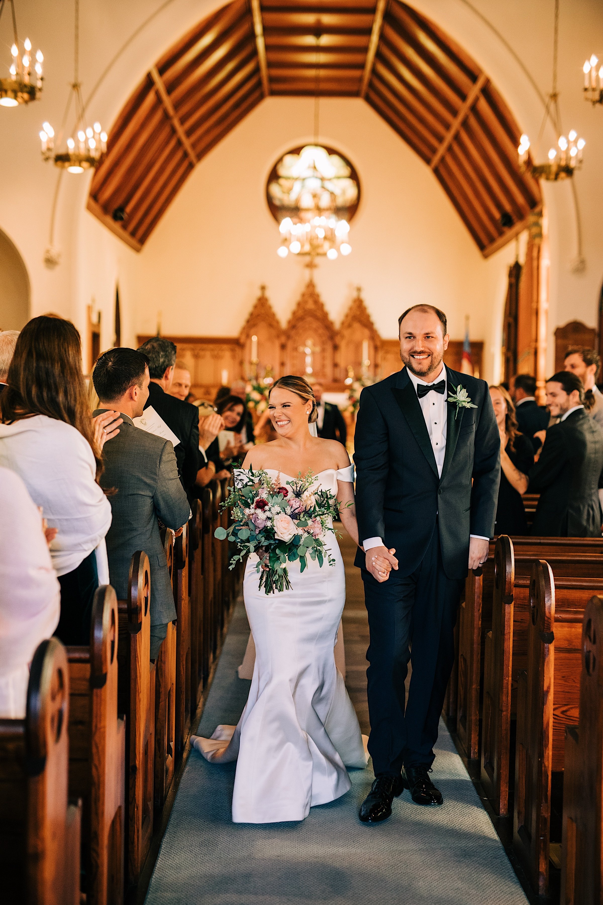 33_wedding exit holy trinity spring lake nj.jpg