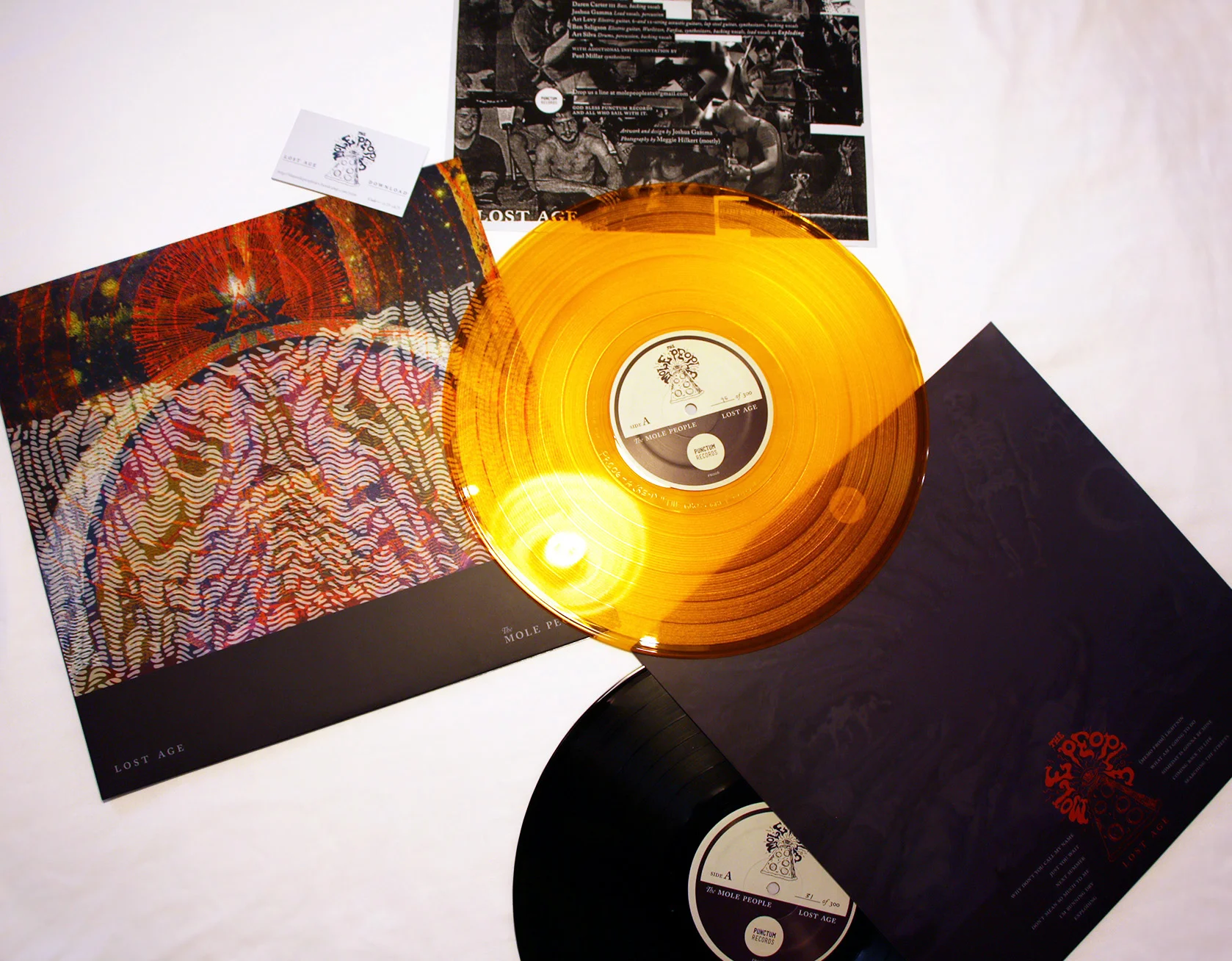 Lost Age album packaging (hand-numbered, 100 of the 300 pressed were on transparent orange vinyl) / 2013–2014