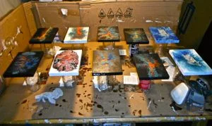 I use a variety of self taught techniques to create abstract paintings that mimic things we see in nature like stone, petrified wood, satellite views, exploding stars, lava and images in a microscope. The paintings are created on professional wood panels with acrylic mediums. Once the paint dries I apply a thick layer epoxy resin. With my 3D series I incorporate original handmade resin sculptures to the painting. Megan Leal 2019