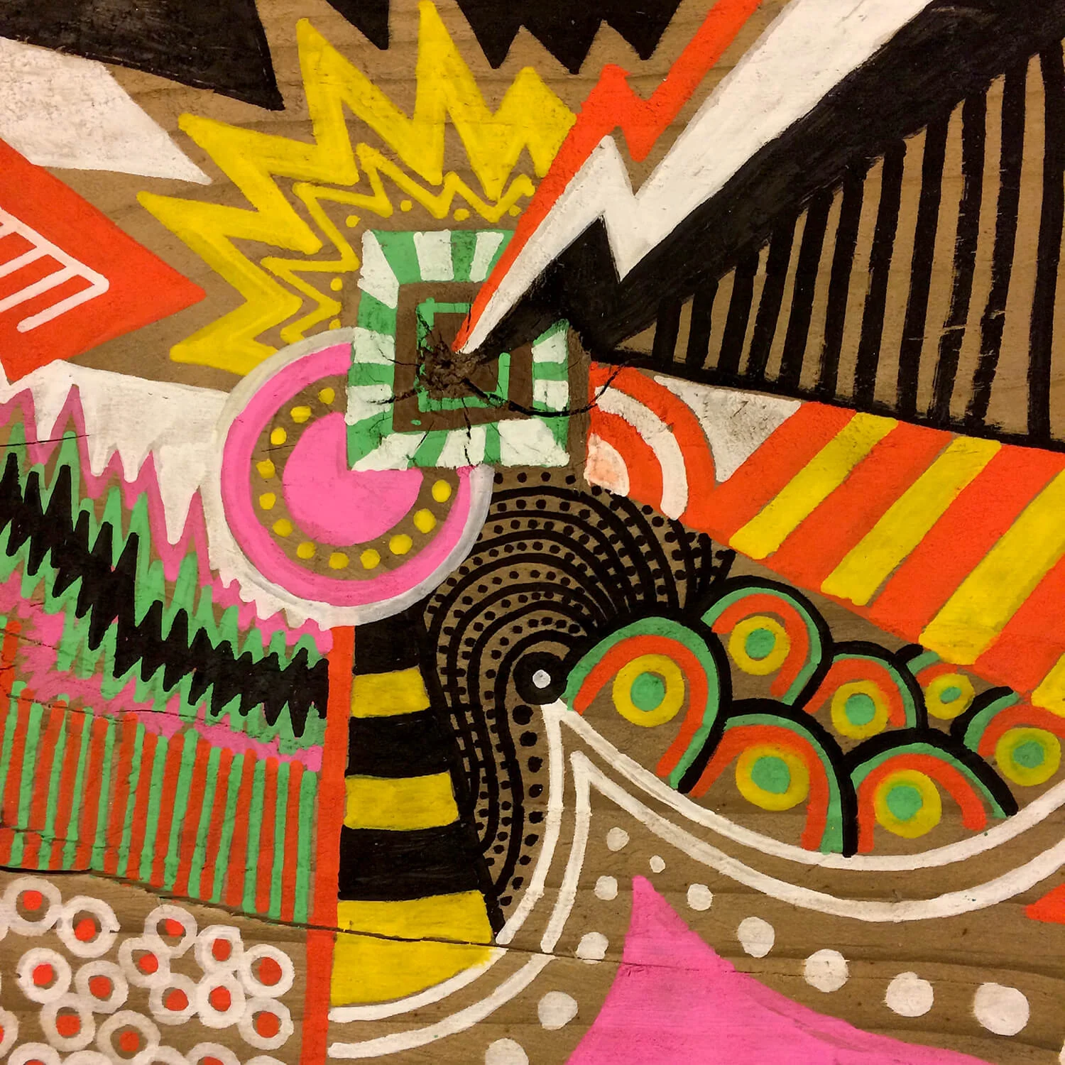 Posca pen on a small block of wood.