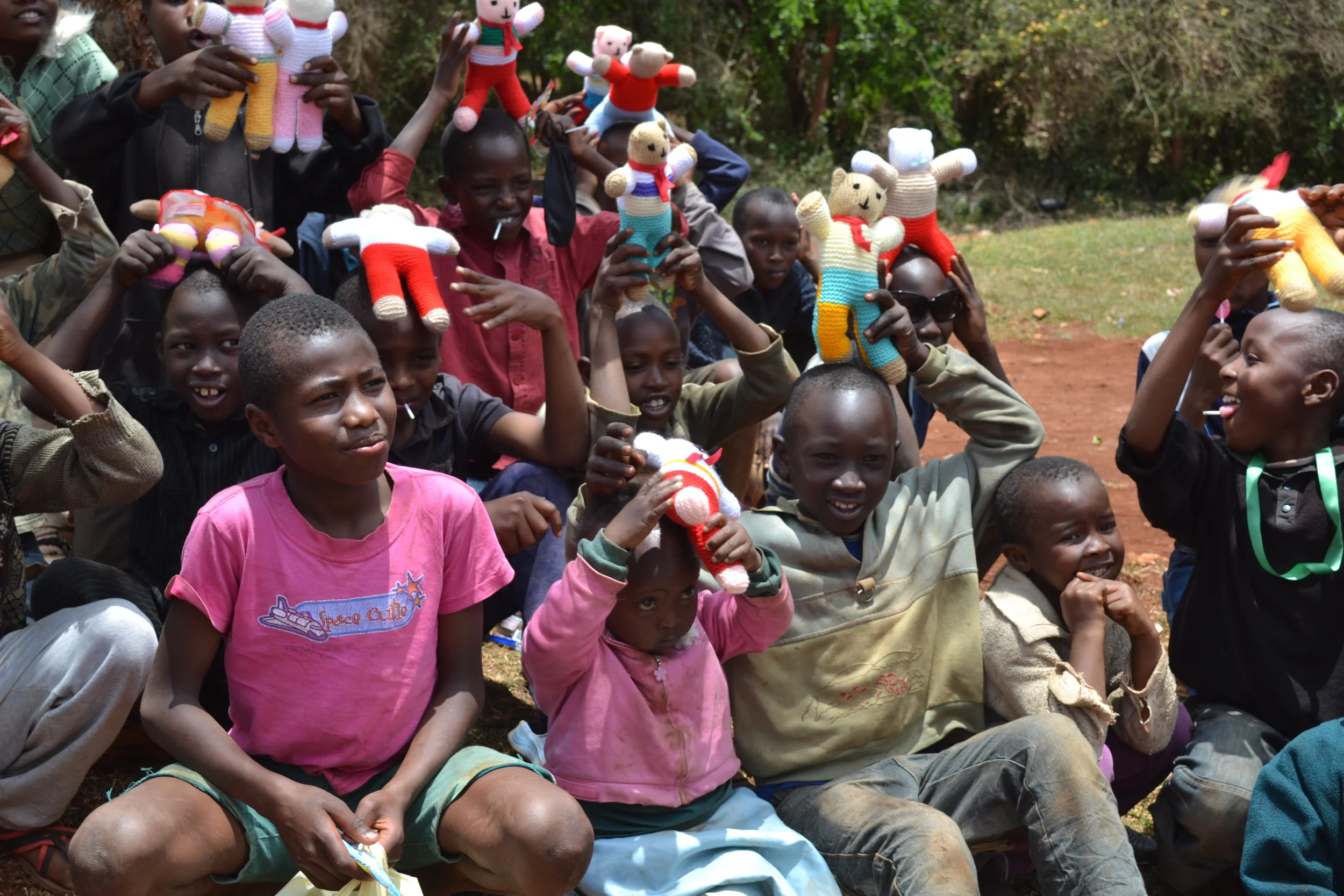 Children at the IDP camp, excited about the toys given to them by the team.