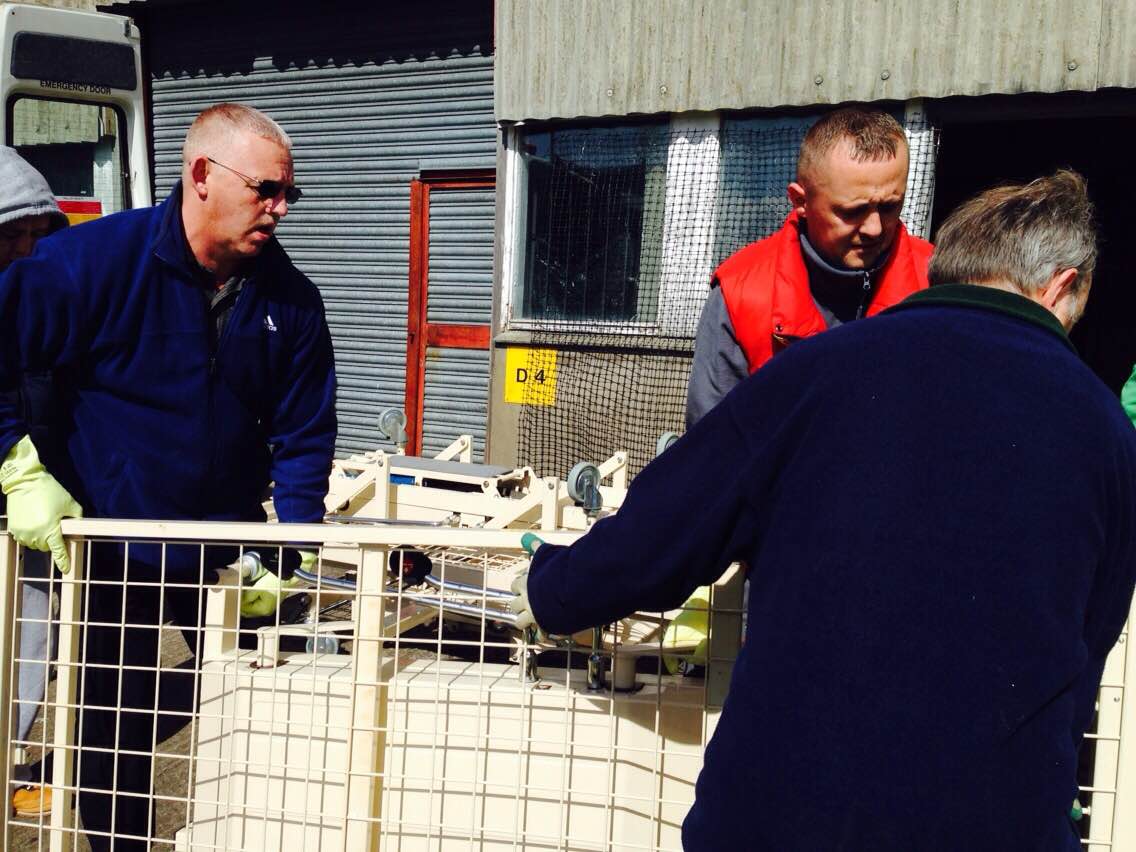 A team of trusty volunteers helping to shift the donations.