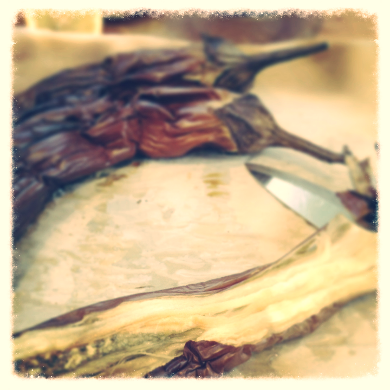 Cooked eggplants ready to be peeled.