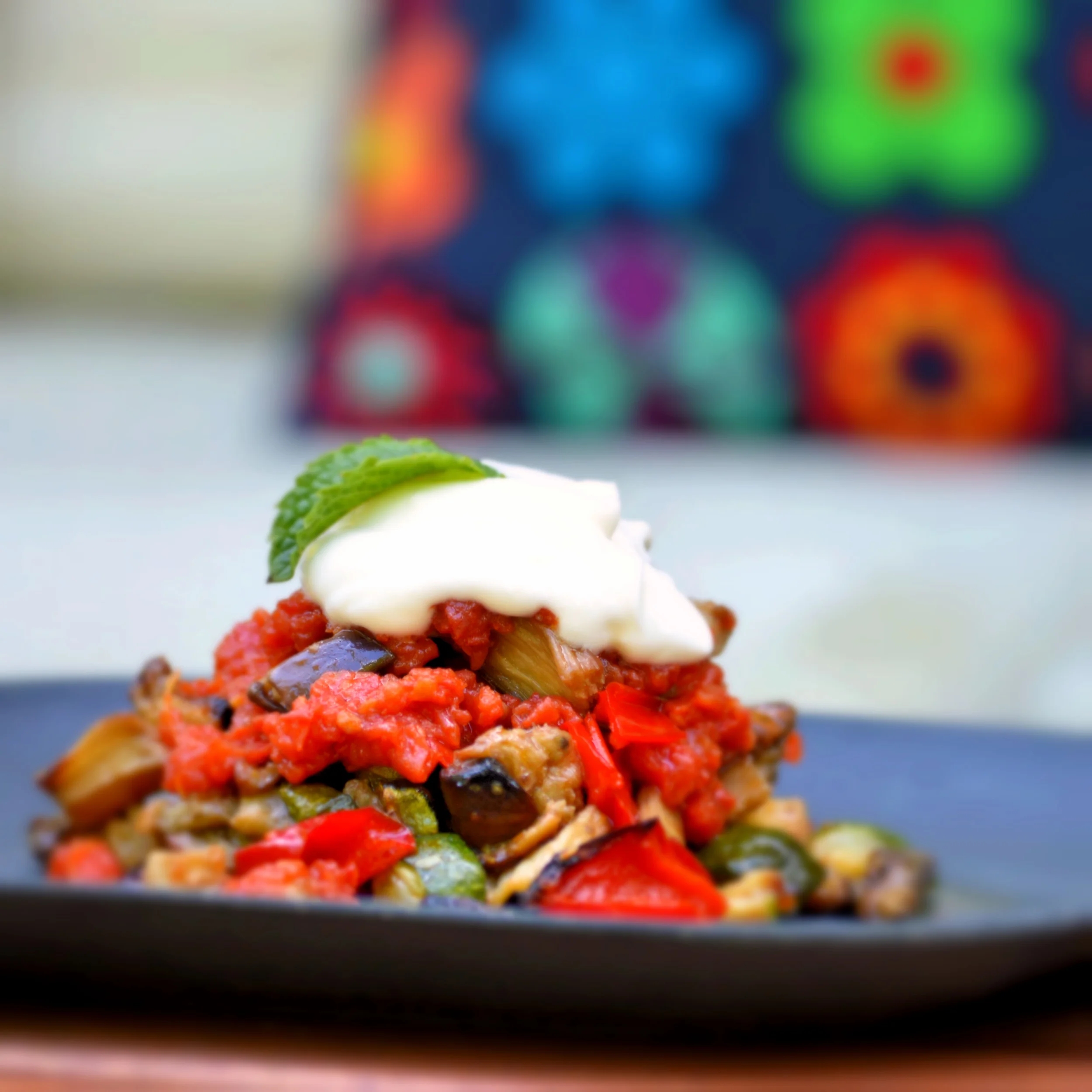 Roasted vegetables medley: Paprika,zucchini, eggplant , tomato and garlic yogurt sauce Vegetarian / gluten free