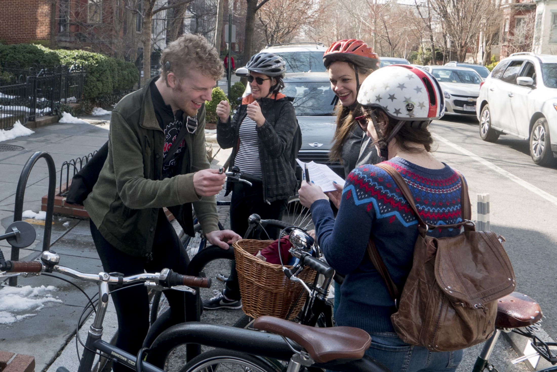 Learning to sign "Girls Rule the World" on Q Street. 