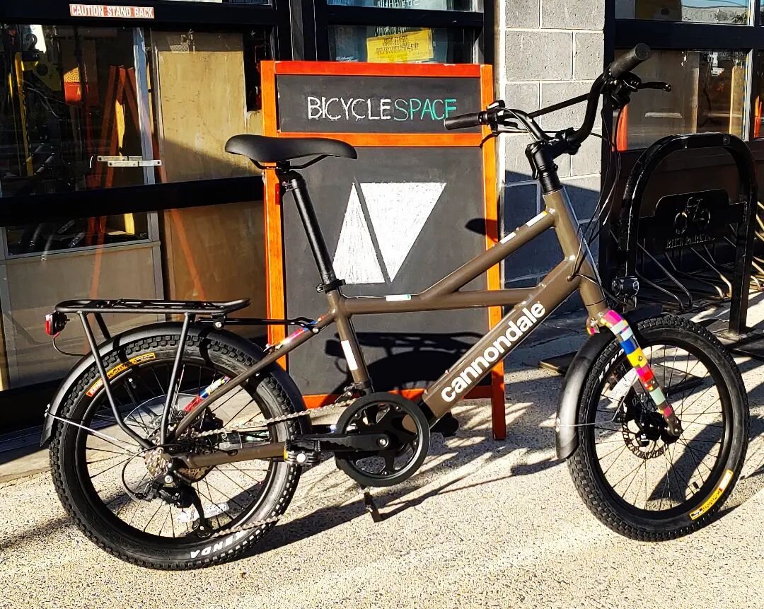 Just in- the latest addition to our growing e-bike options, it's the @ridecannondale Compact Neo! Turn the stem &amp; fold the pedals and it slides right up next to a wall. Out on the road, it's agile &amp; super-peppy right when you need it to accel