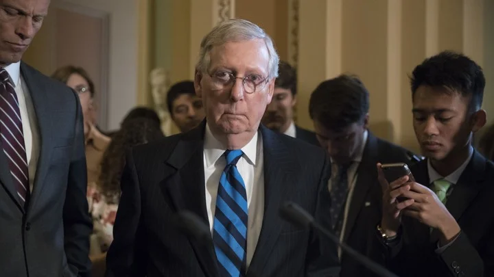 Senate Majority Leader Mitch McConnell proposes a revised health care bill in July 2017. Photo J. Scott Applewhite, AP .