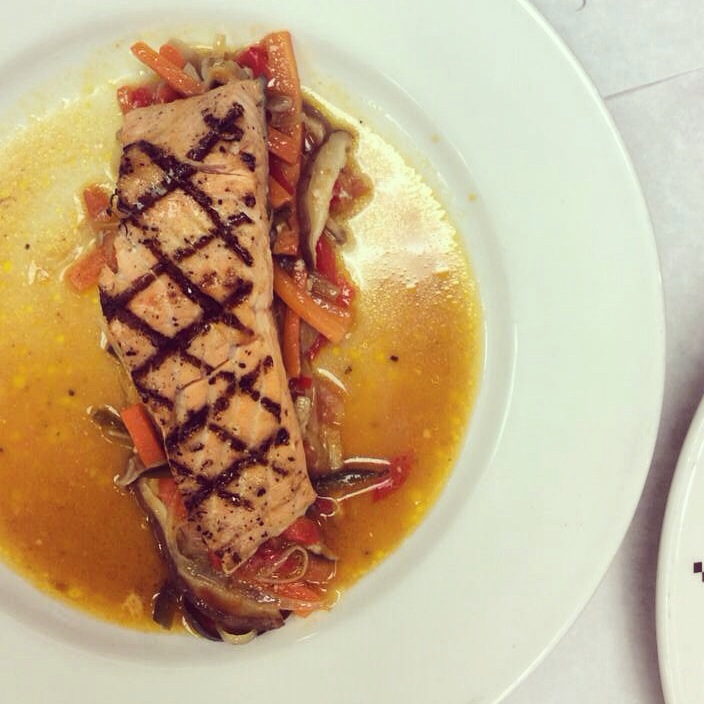 grilled tranche of salmon with steamed vegetable medley
