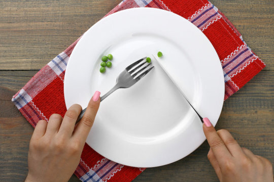 How caloric restriction prevents negative effects of aging in cells