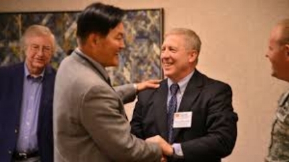 Dr. Lewandowski with Dr. Tarn, Chair of Business Information Systems